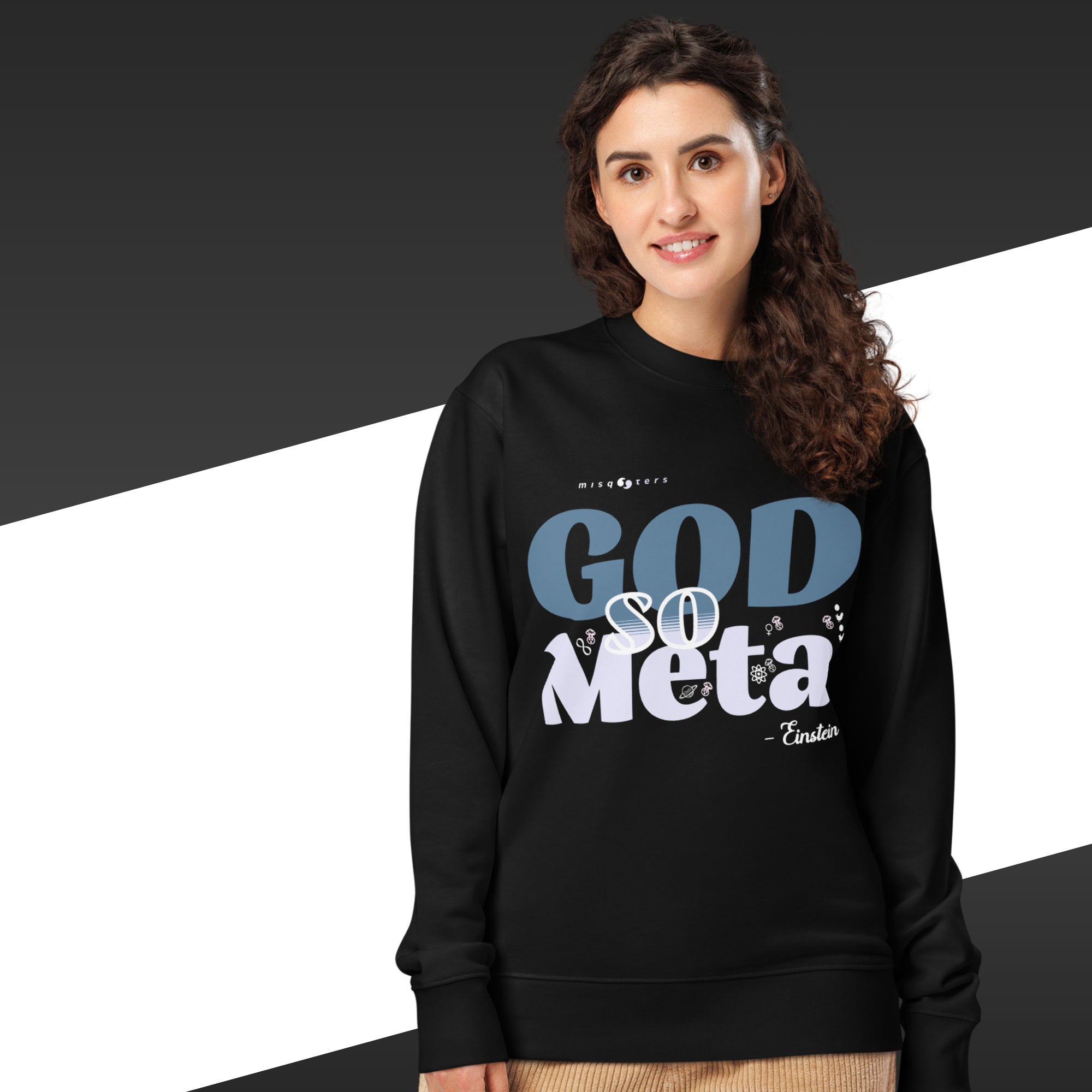 Woman wearing a black sweatshirt with 'GOD SO META' text design.