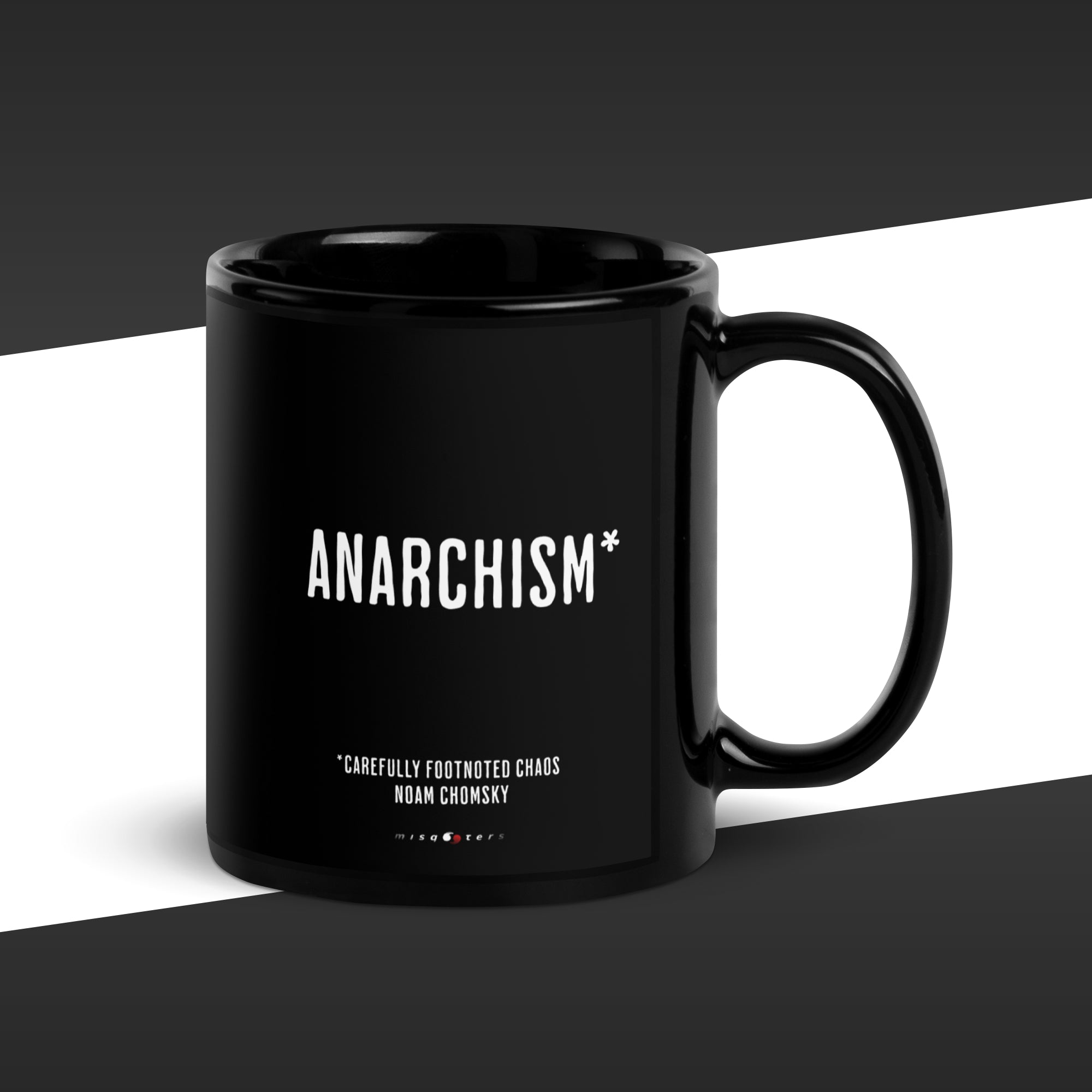 Black mug with 'ANARCHISM*' text on a black and white background