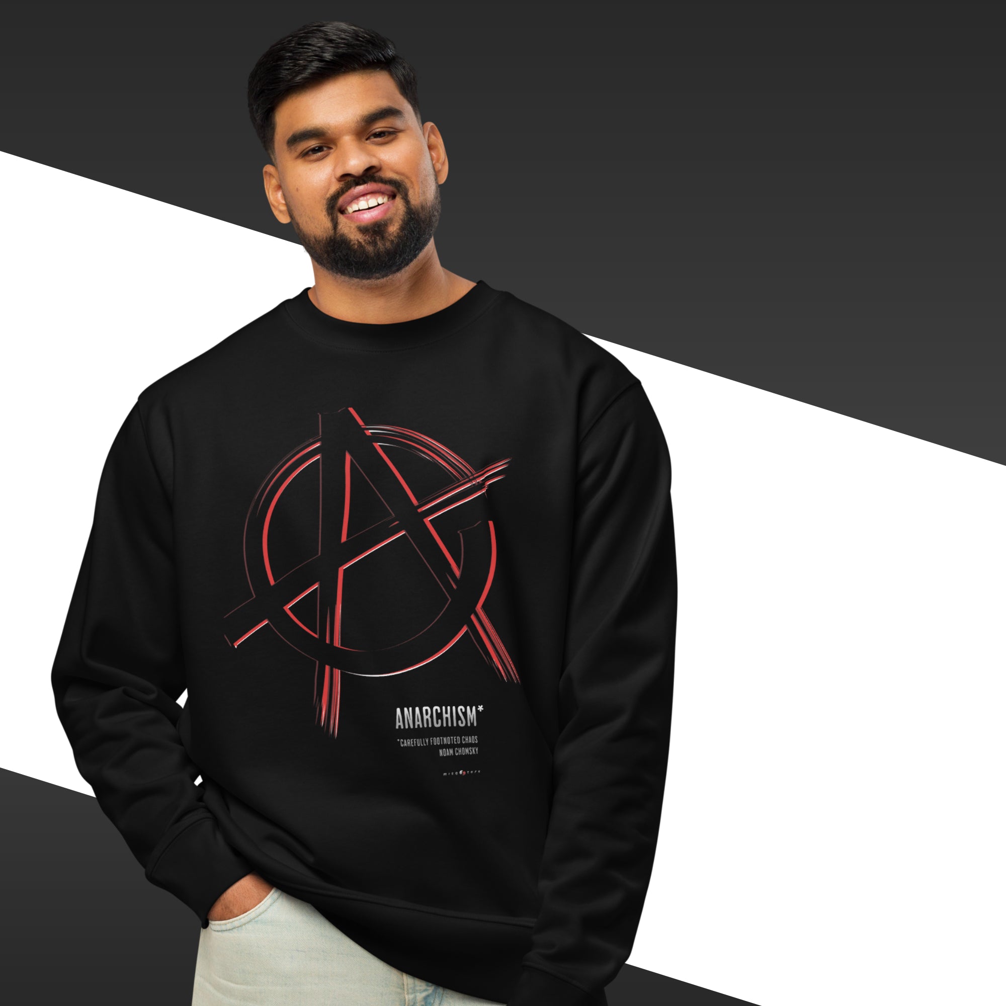 Man wearing a black sweatshirt with a red and white symbol and text on a black and white background