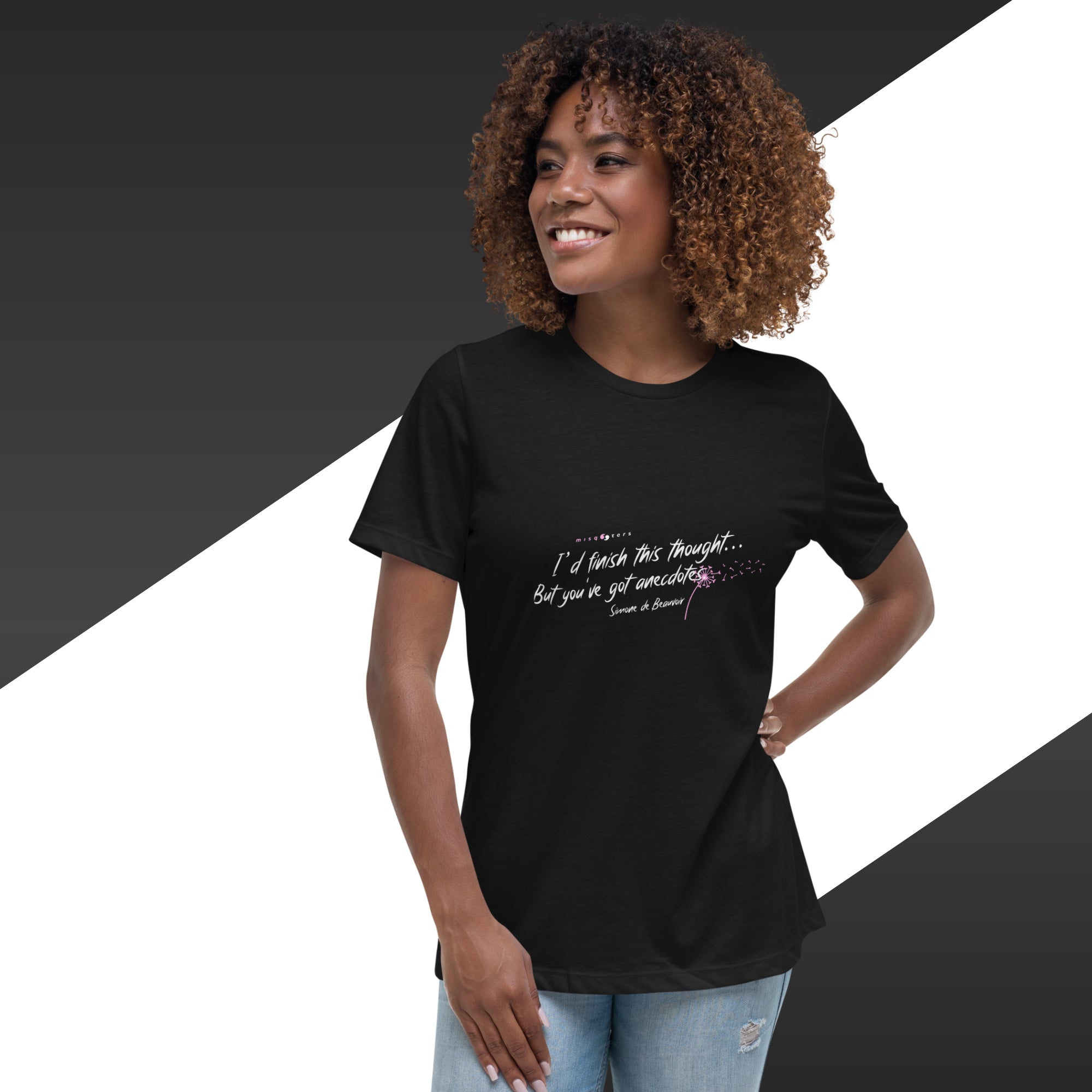 Woman wearing a black t-shirt with text on a black and white background