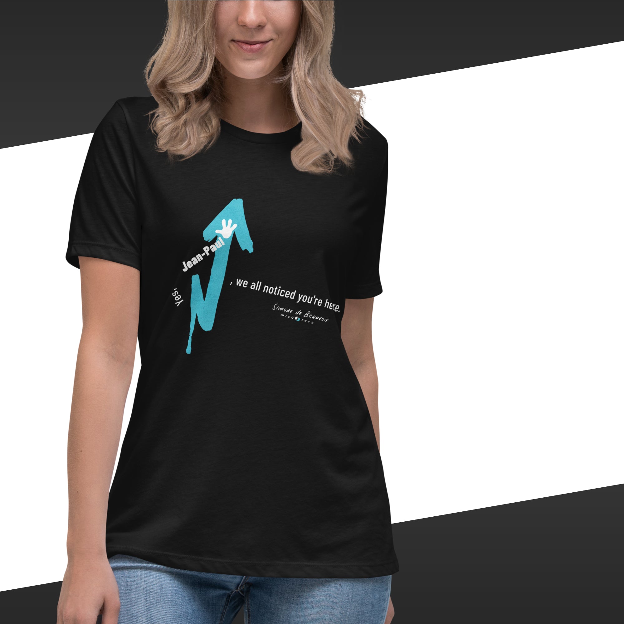 Person wearing a black t-shirt with a blue graphic design on a white background