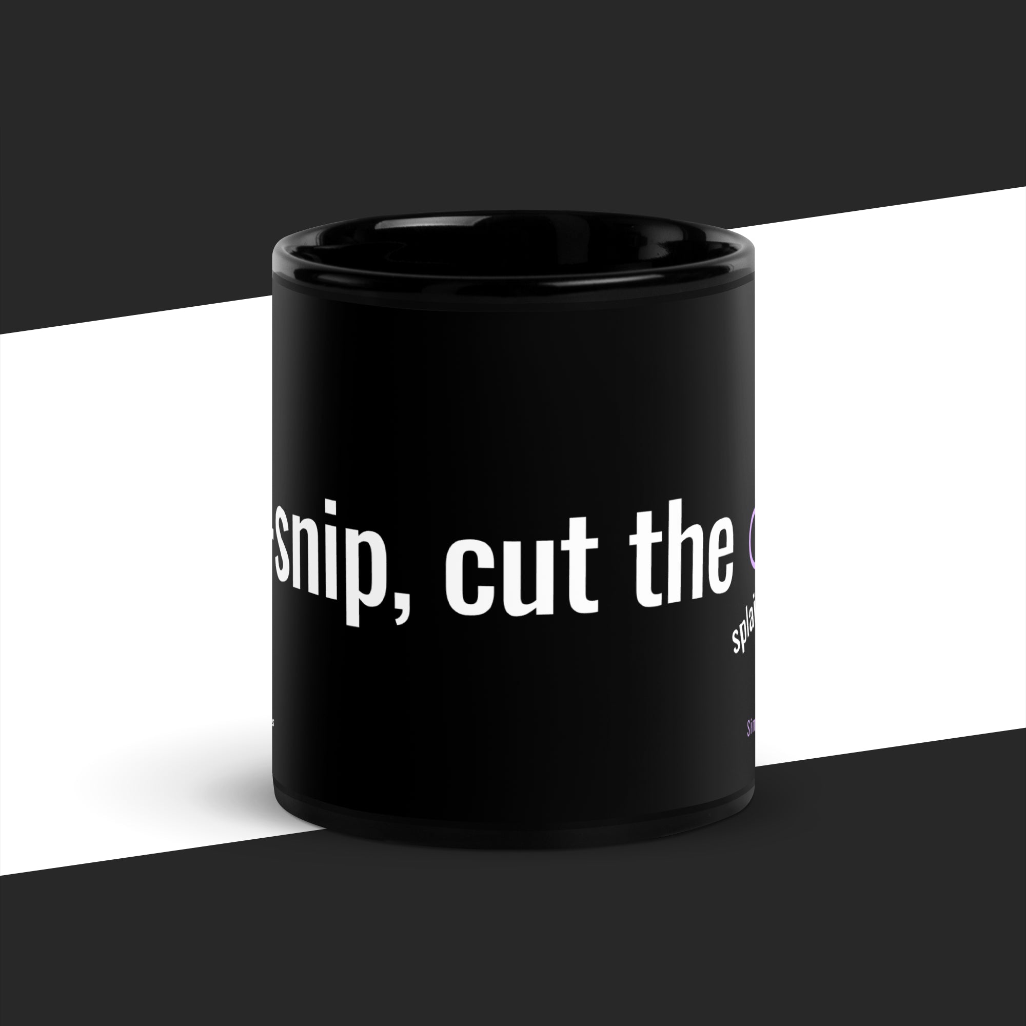 Black mug with white text on a black and white background
