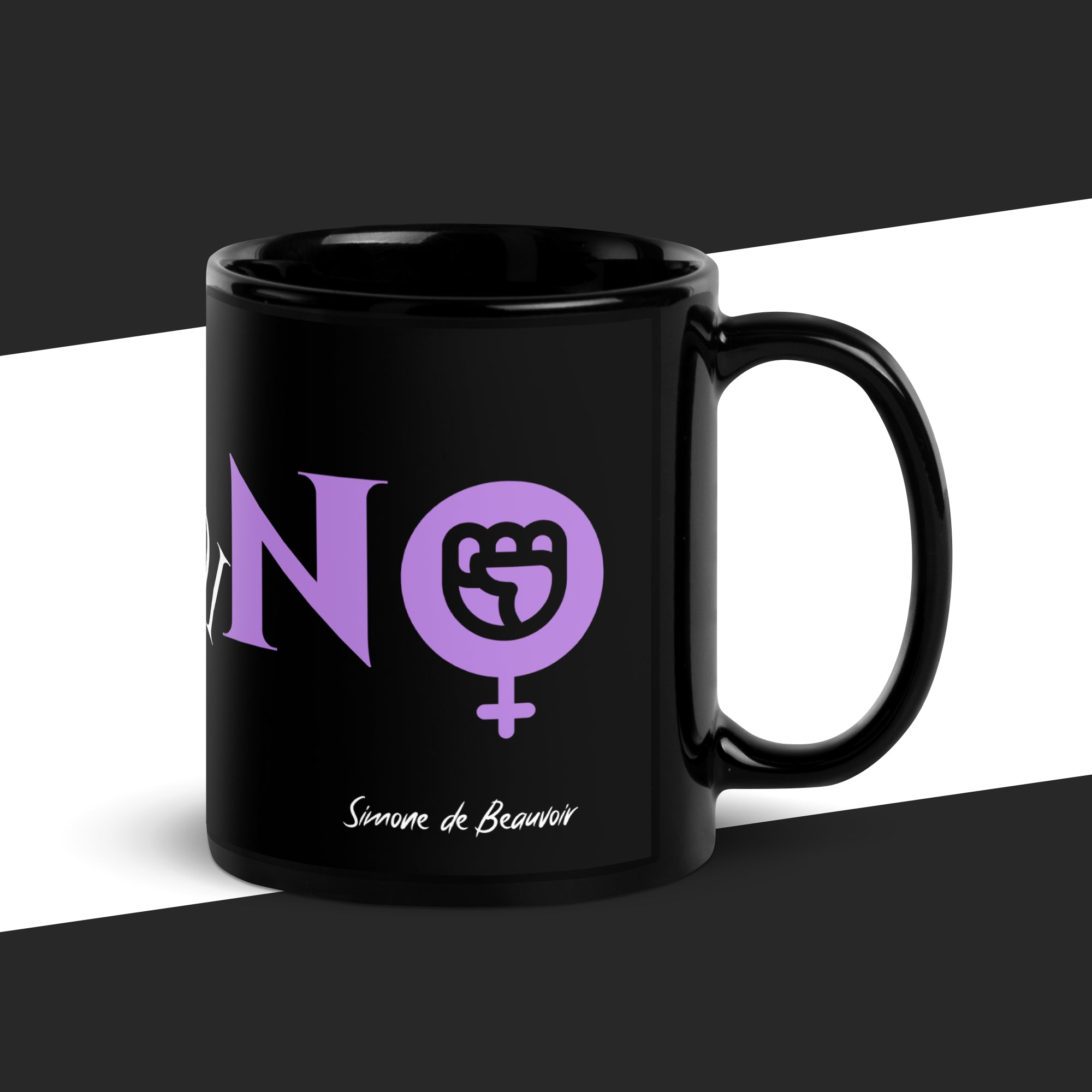 Black mug with purple graphic and text on a black and white background