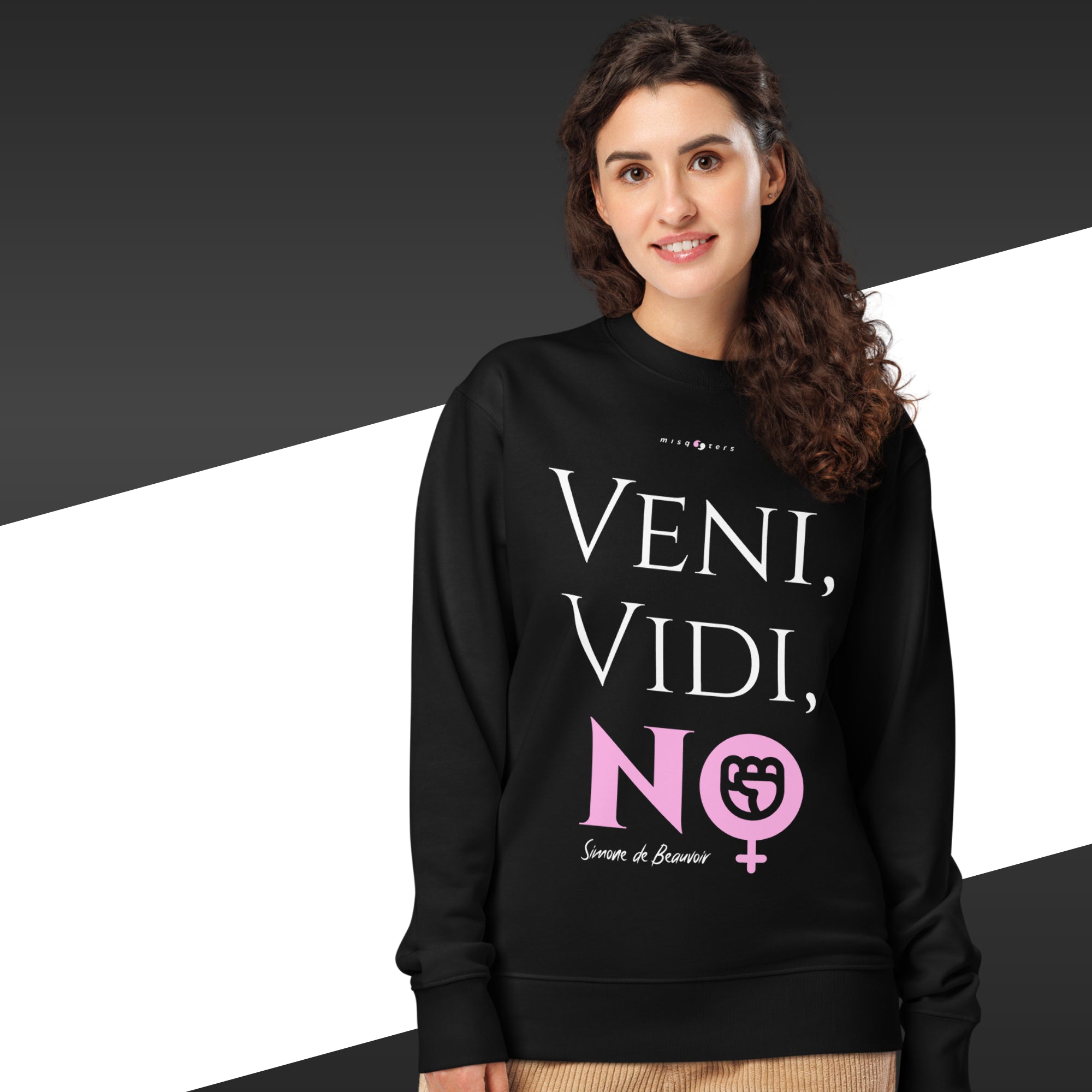 Woman wearing a black sweatshirt with 'Veni, Vidi, No' text and logo on a black and white background