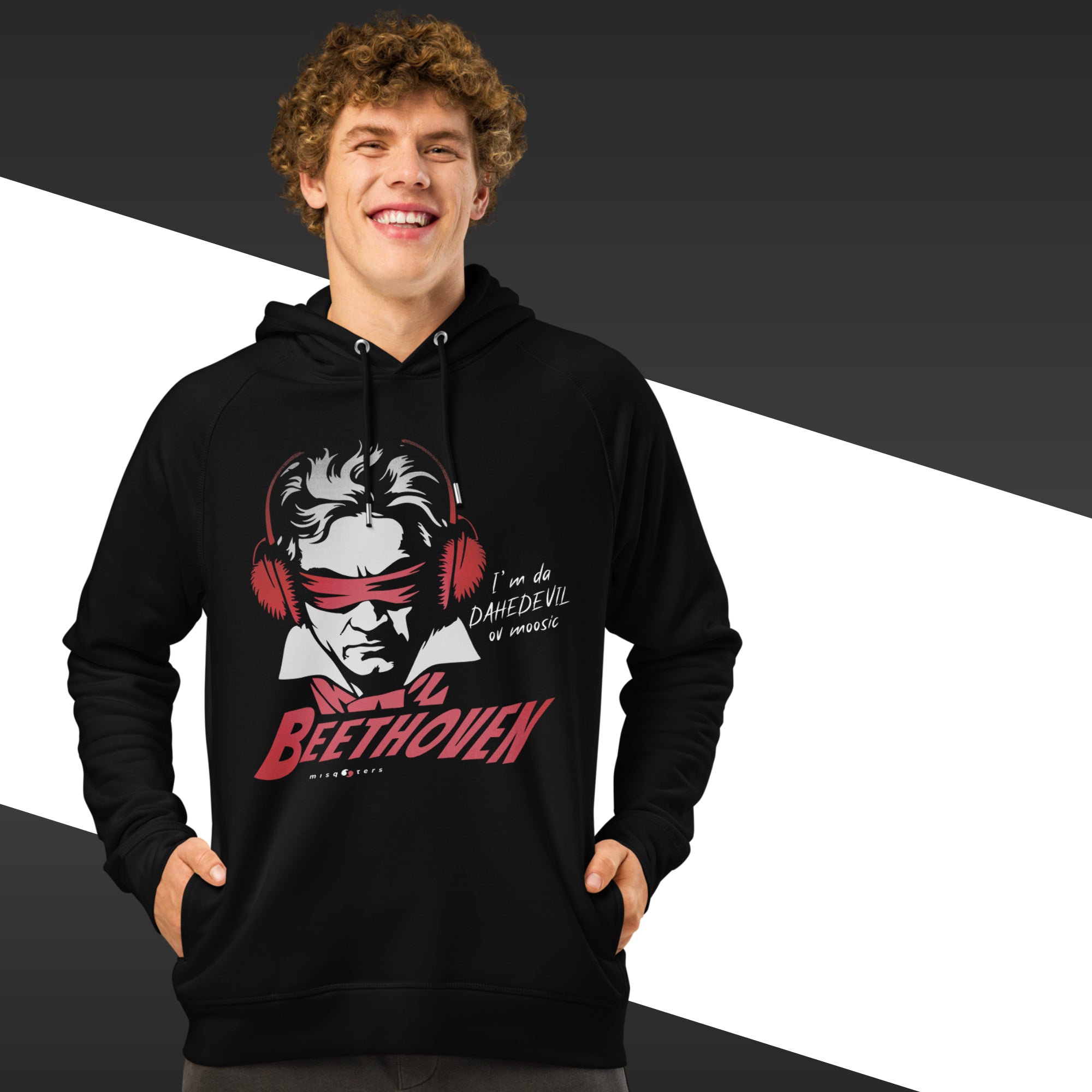Person wearing a black hoodie with a graphic design of Beethoven wearing headphones on a black and white background