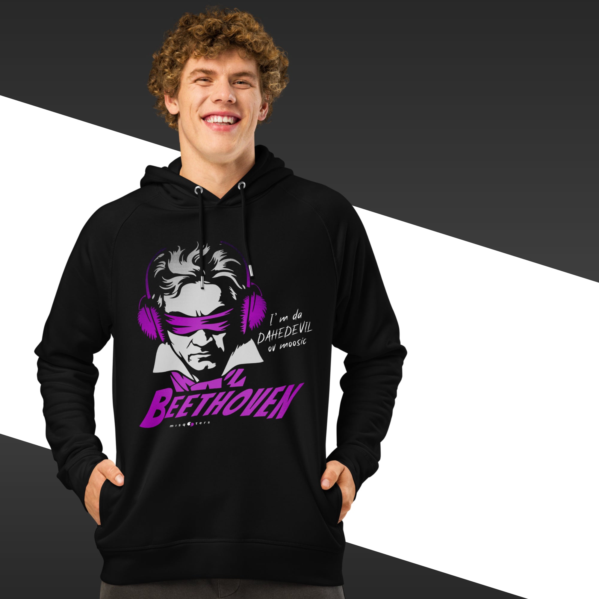 Person wearing a black hoodie with a graphic design of Beethoven wearing headphones and text.