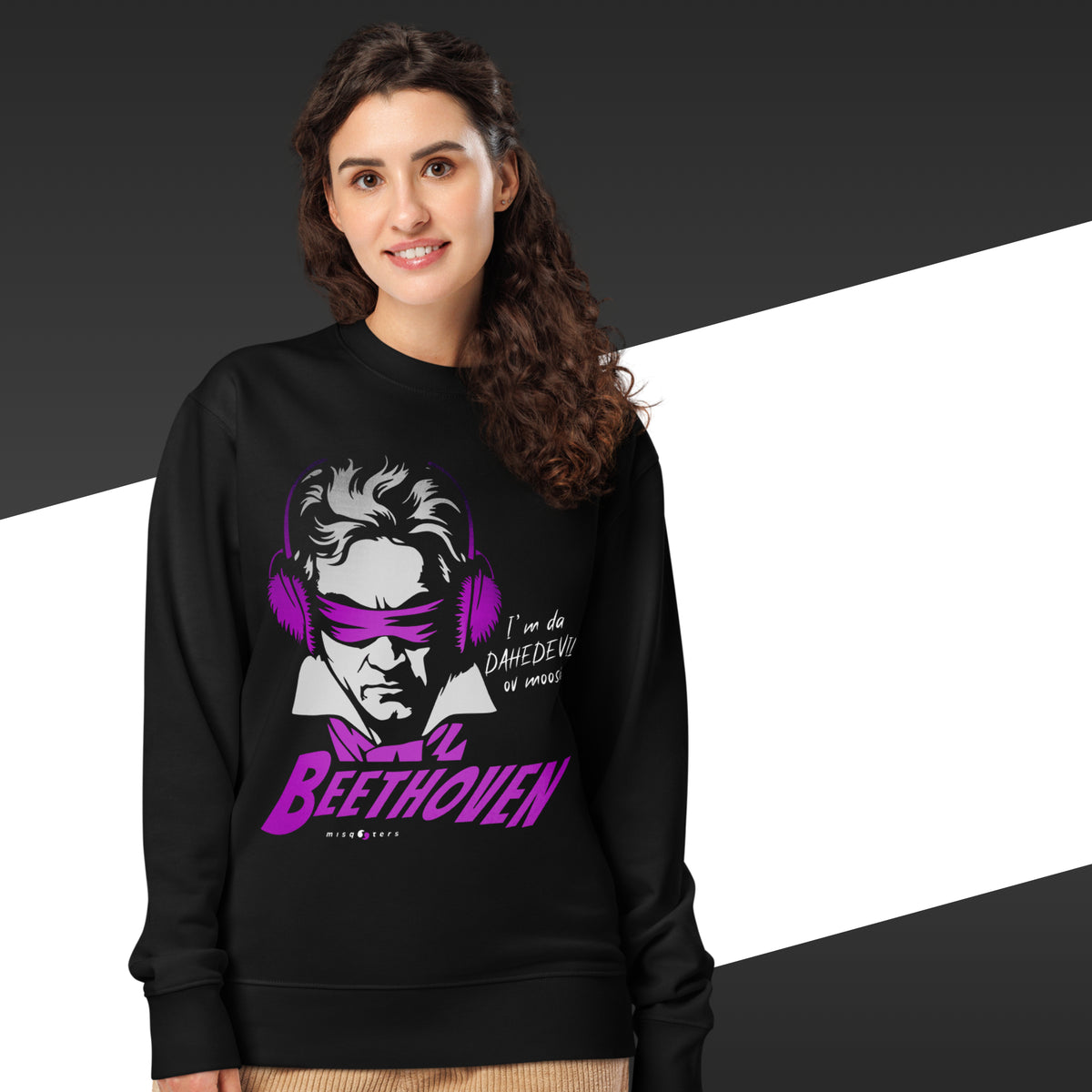 Person wearing a black sweatshirt with a graphic design of Beethoven wearing headphones and sunglasses.