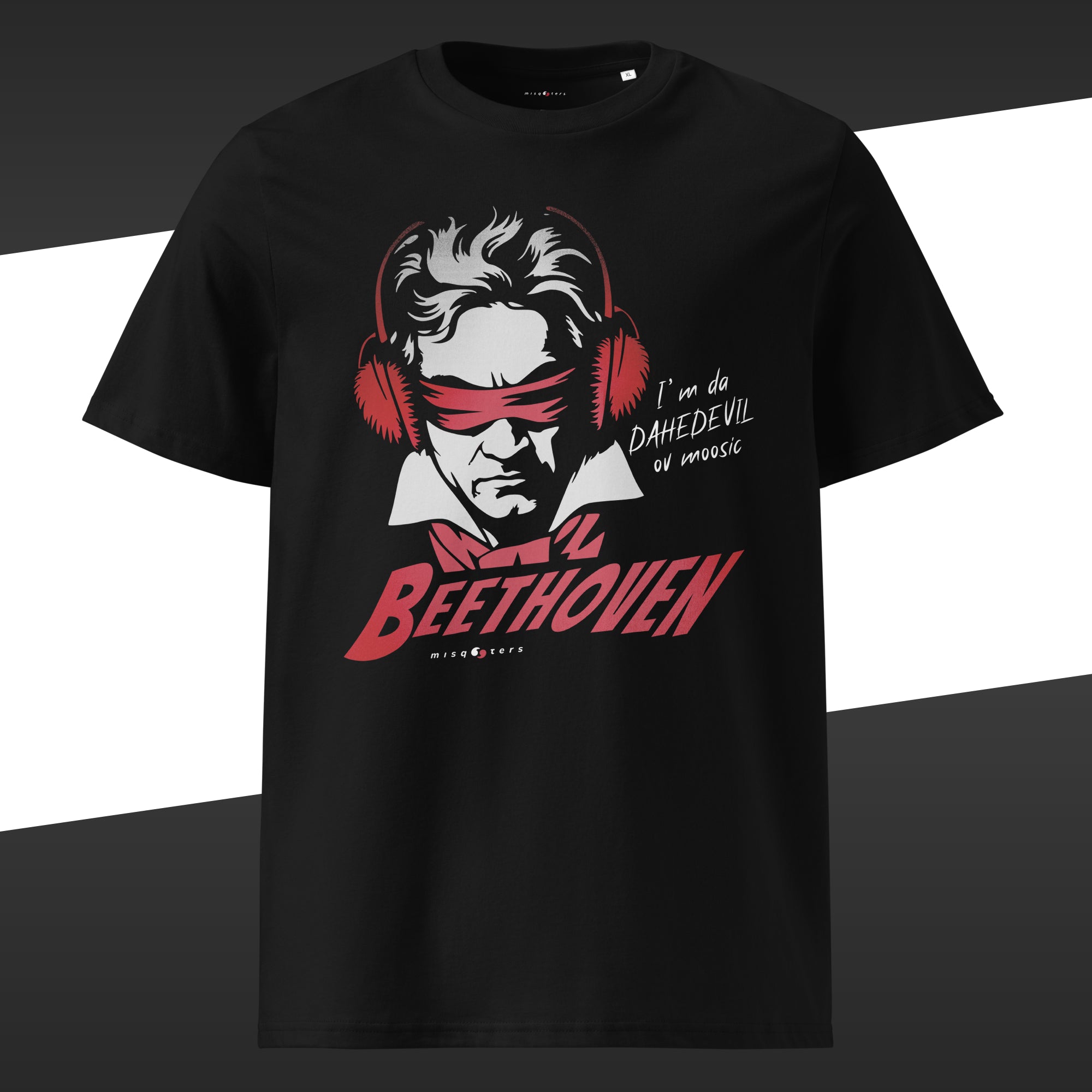 Black t-shirt with a red and white graphic of Beethoven wearing ear protectors, is blidnfolded, and featuring the fake quote "I´m da Dahedevil ov moosic" by Beethoven