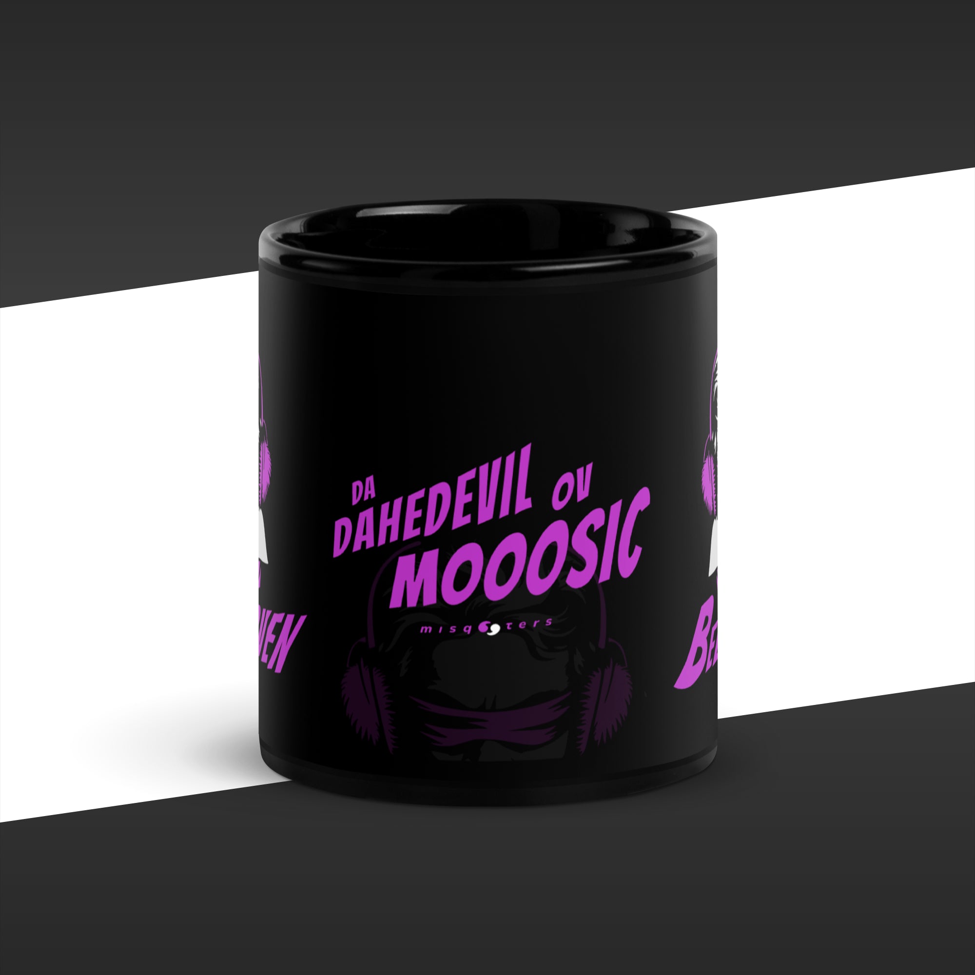 Black mug with purple text and graphics on a black and white background