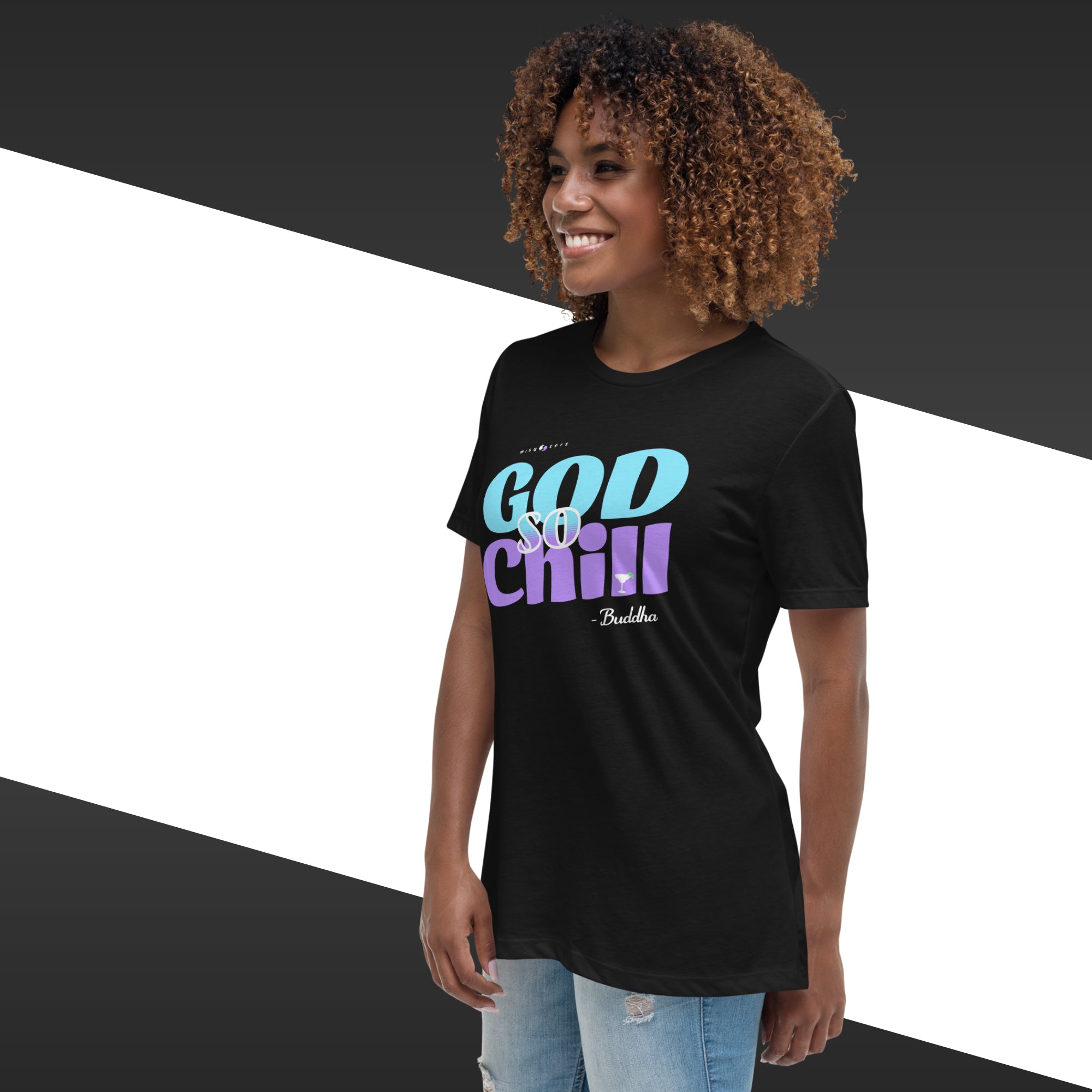 Woman wearing a black t-shirt with colorful text design on a geometric background