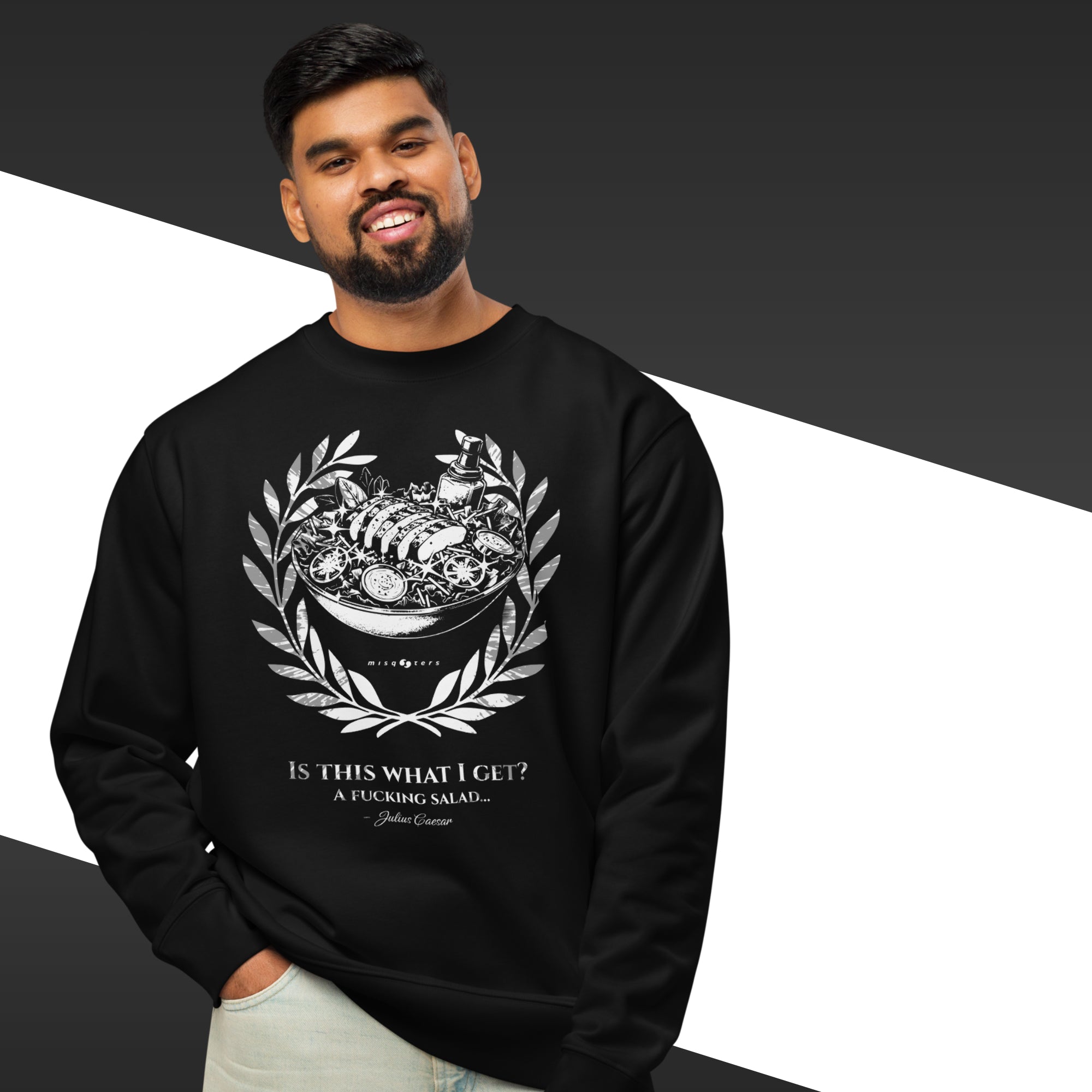 Man wearing a black sweatshirt with a graphic design and text on a white background