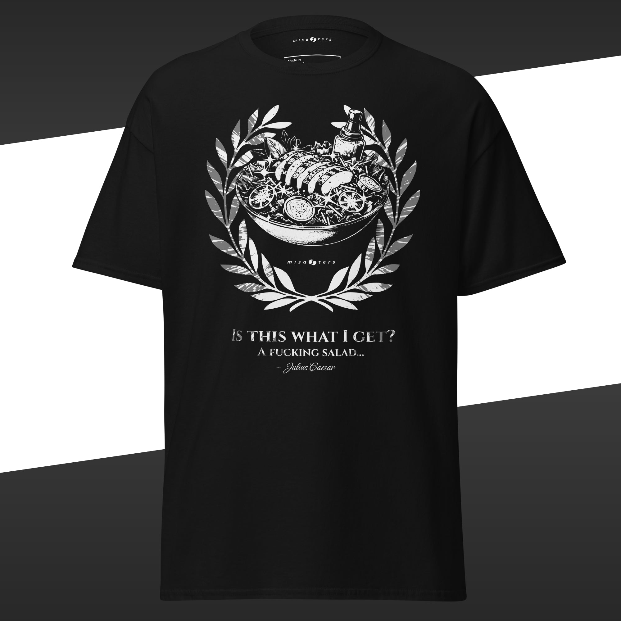 Black t-shirt with white graphic design of a salad and the fake quote "Is this what I get" by Julius Caesar