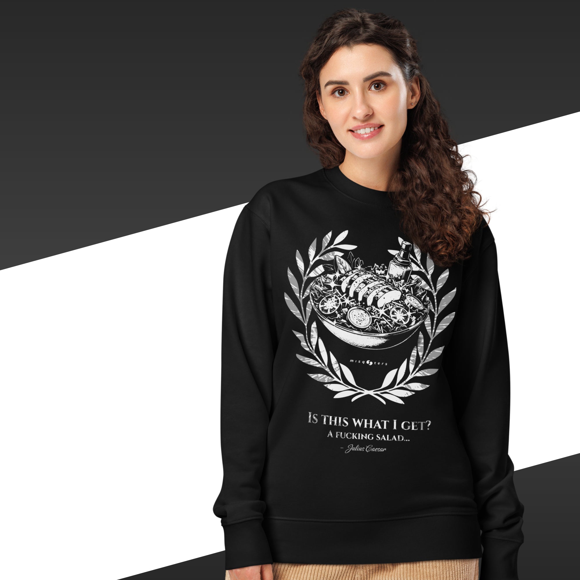 Woman wearing a black sweatshirt with a white graphic design and text.