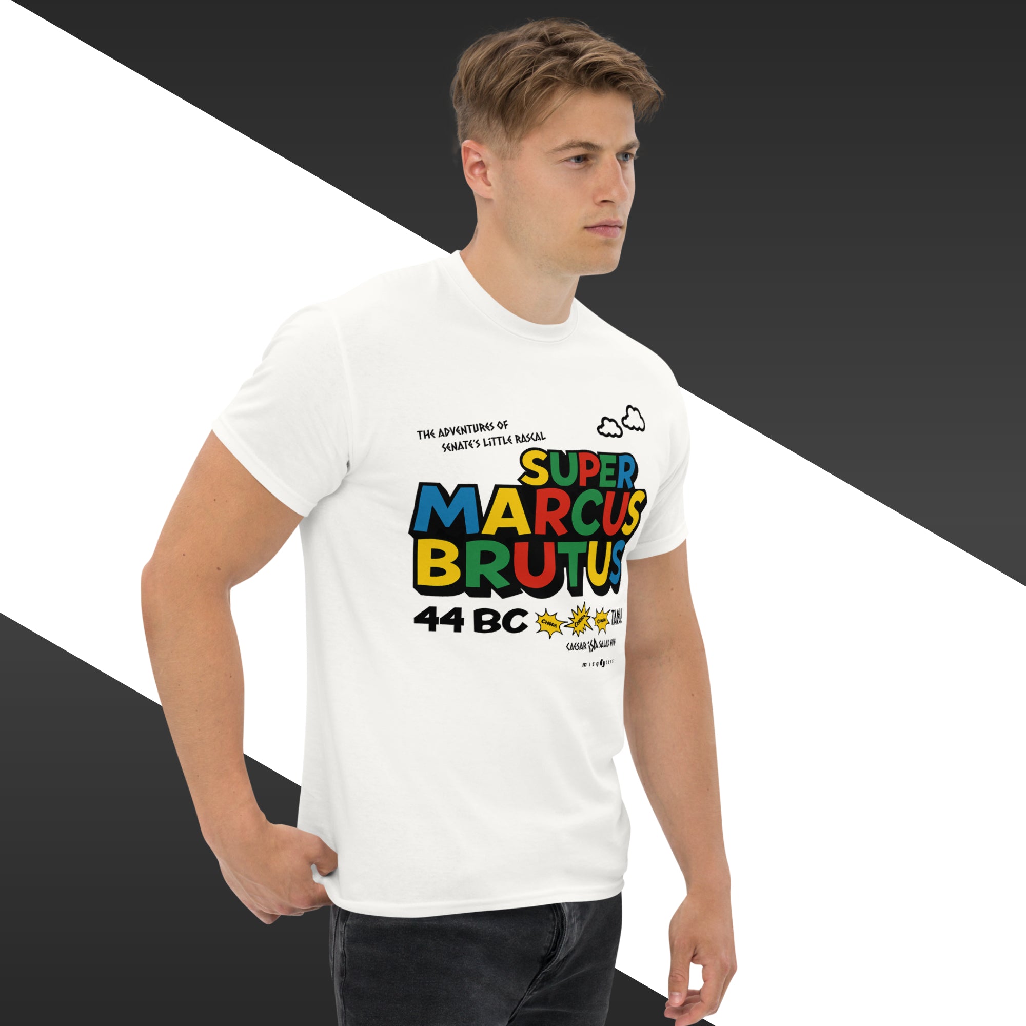Man wearing a white t-shirt with colorful text design on a black and white background