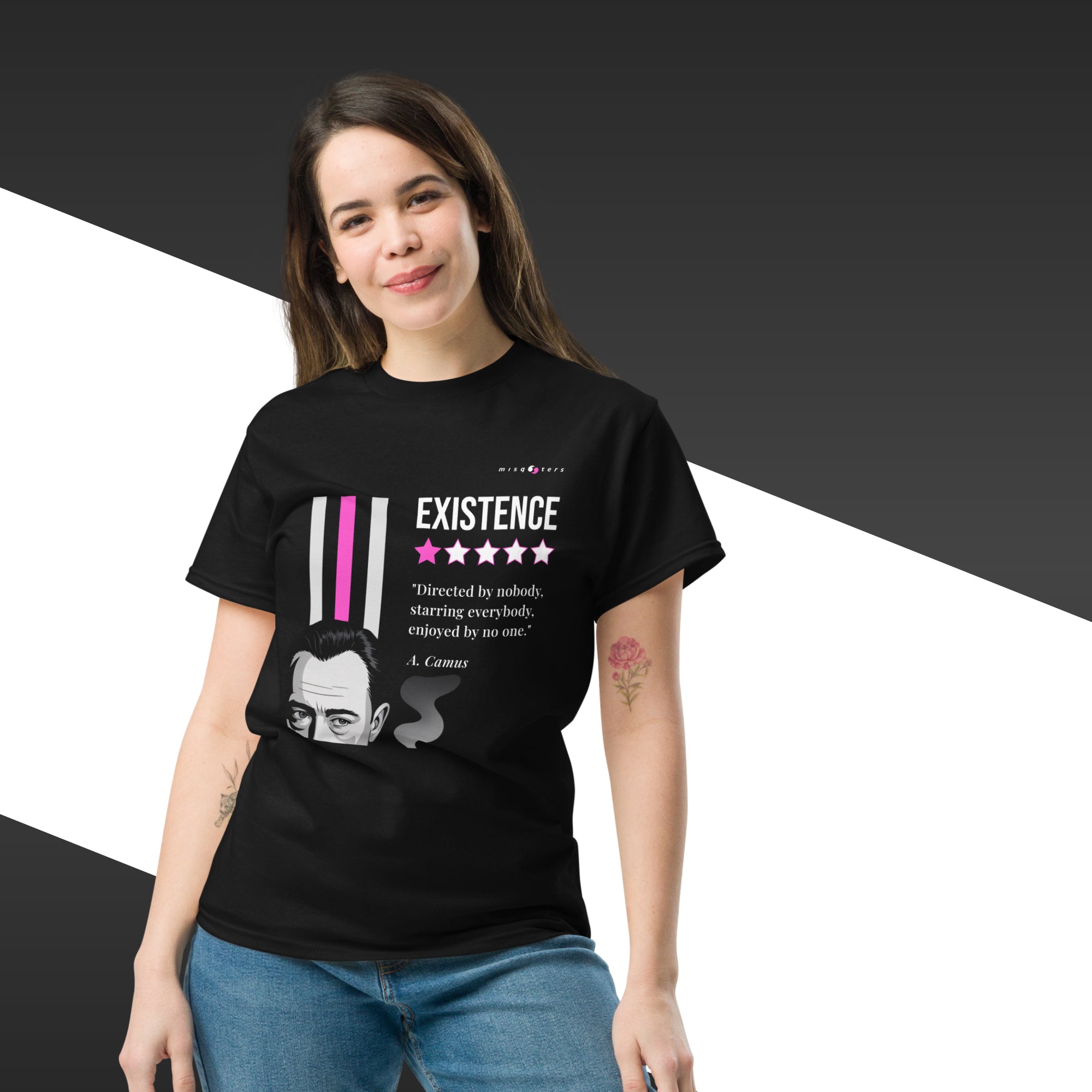 Person wearing a black t-shirt with a graphic design and text on a black and white background
