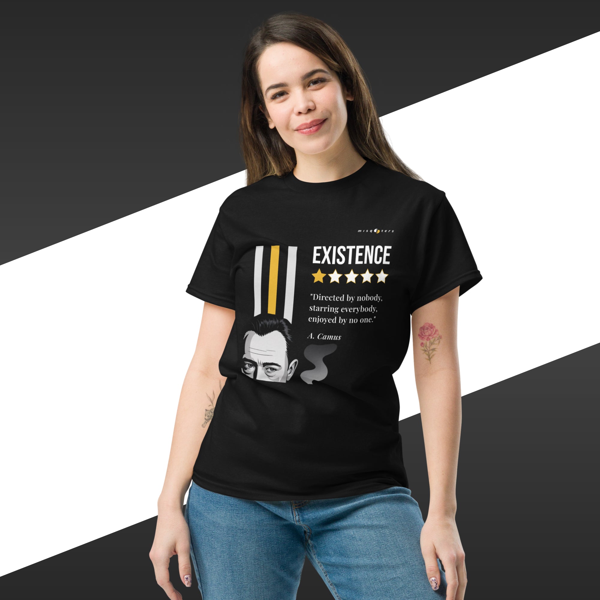 Person wearing a black t-shirt with a graphic design and text on a black and white background