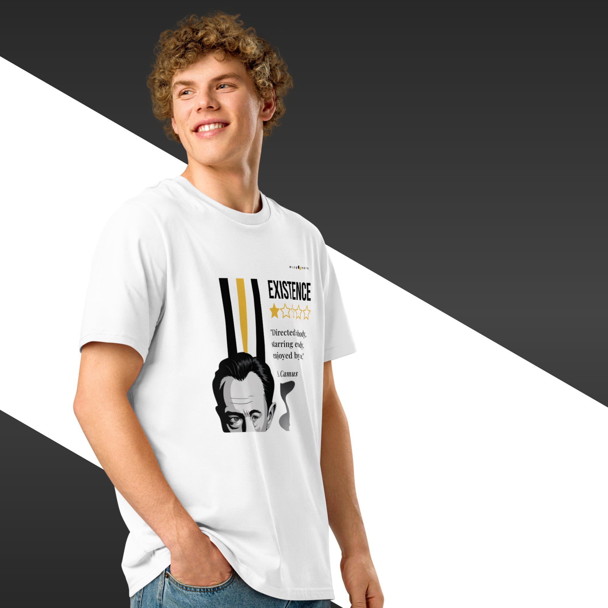 Man wearing a white t-shirt with a white and yellow graphic of Albert Camus and a quote