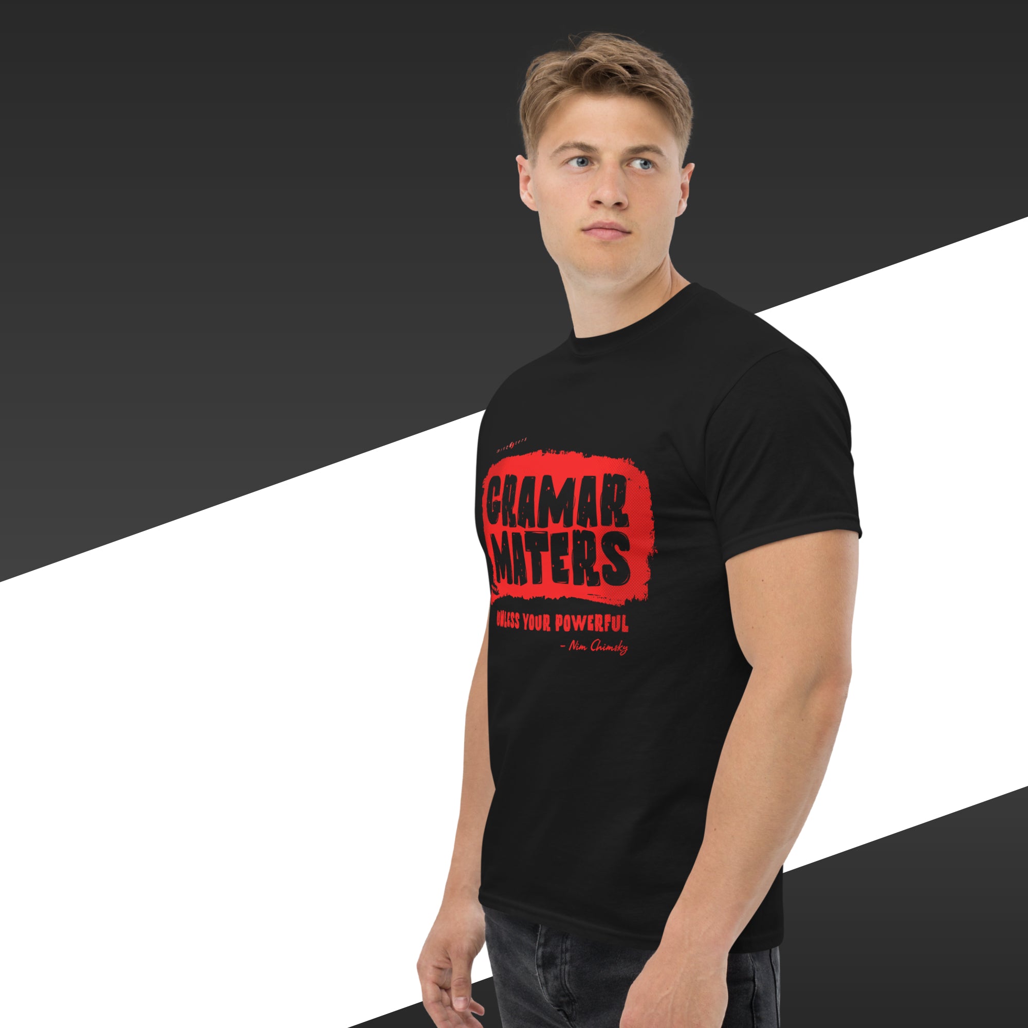 Man wearing a black t-shirt with red text on a black and white background