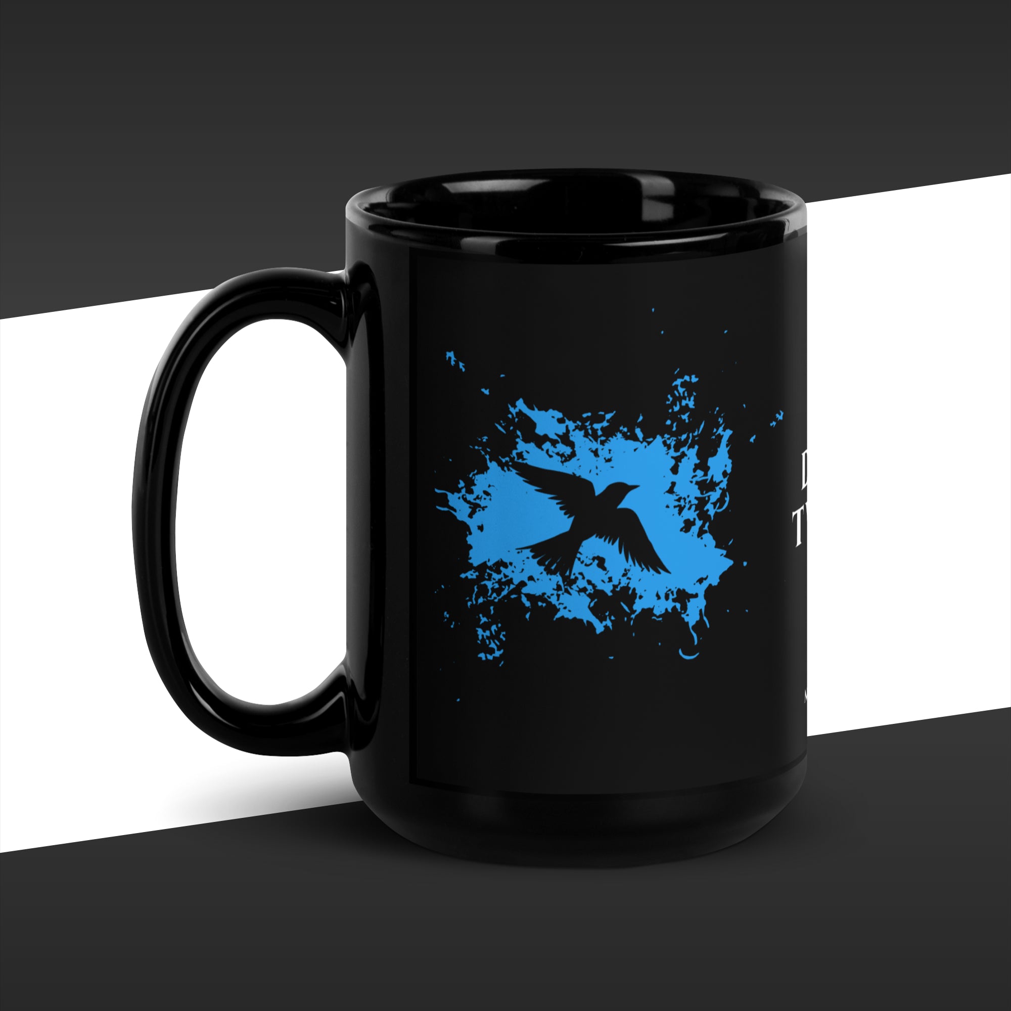 Black mug with blue bird design