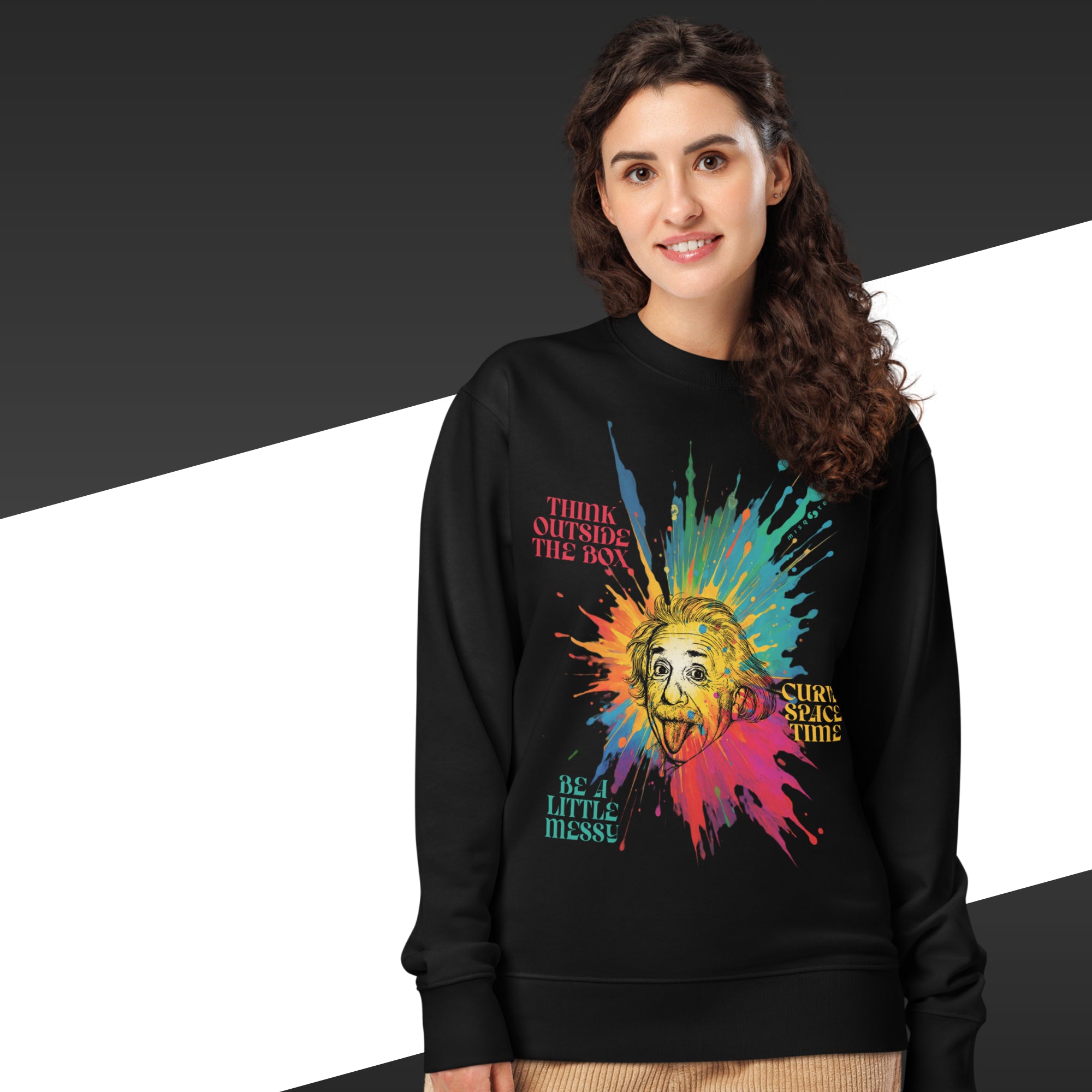 Woman wearing a black sweatshirt with colorful graphic design and text.