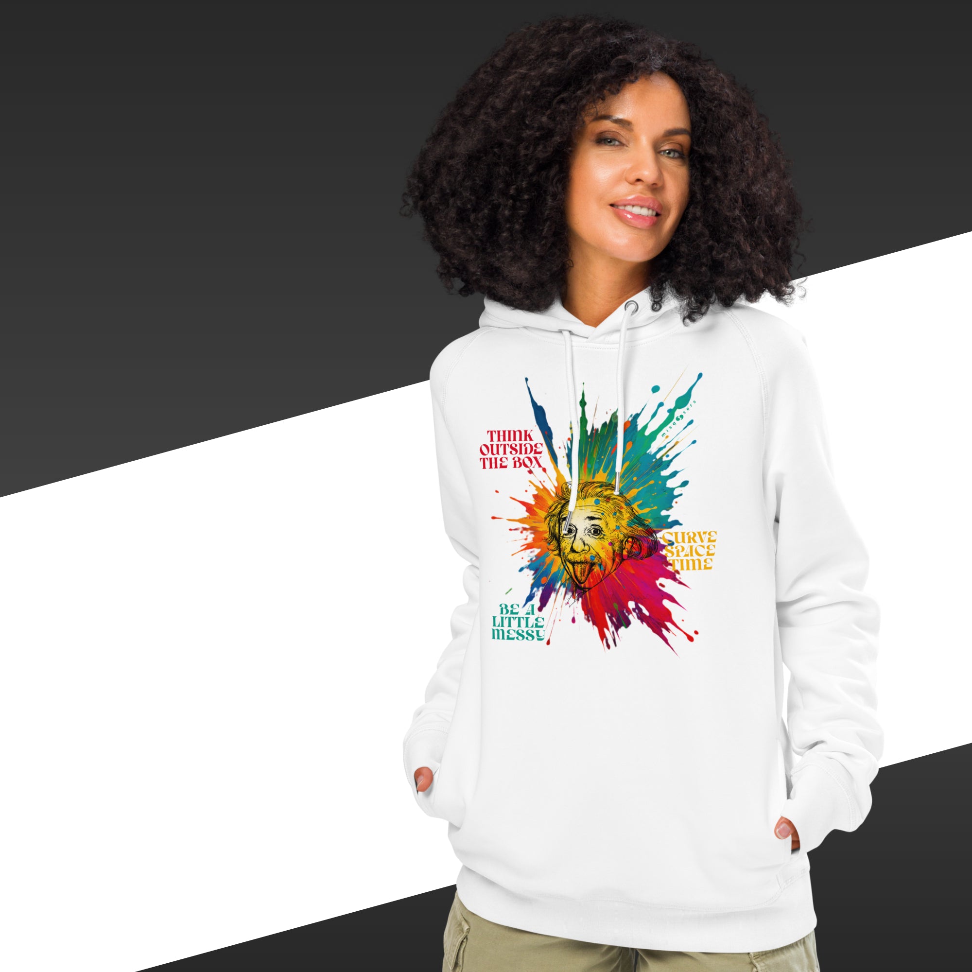 Woman wearing a white hoodie with a colorful graphic design on a black and white background
