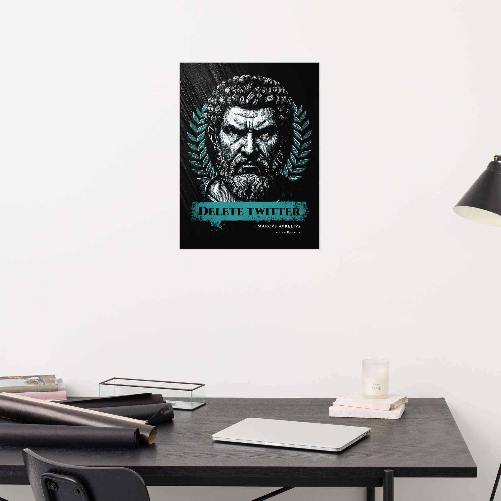 Poster of the classical figure Macrus Aurelius with the text Delete Twitter on a wall above a desk with office supplies.