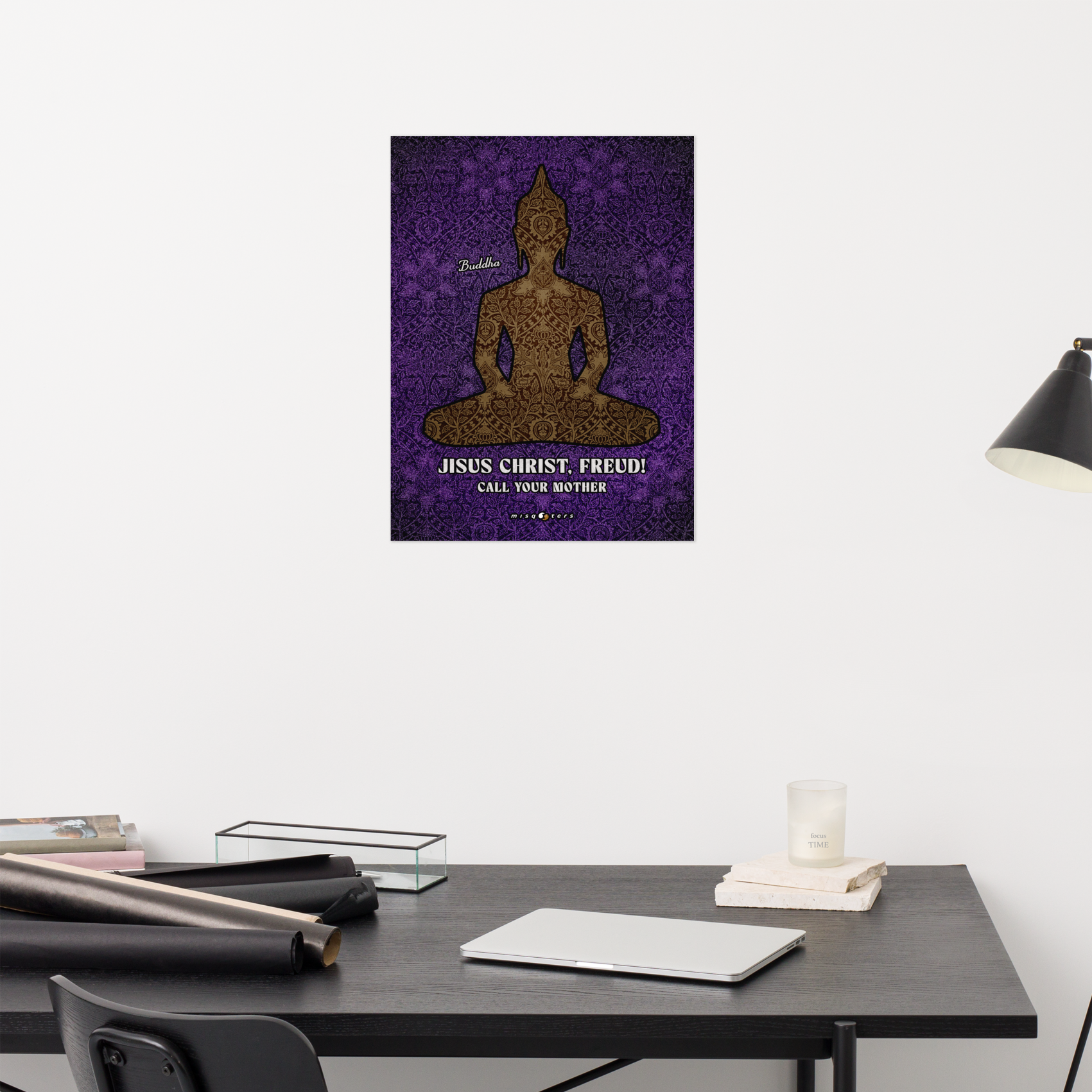 Poster of a Buddha figure with text on a wall above a desk.