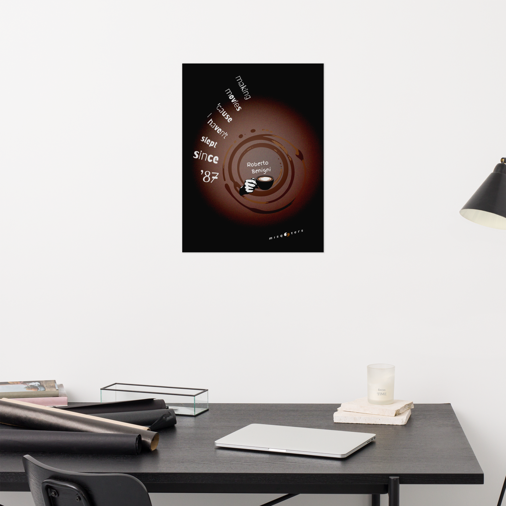Wall art with a coffee-themed design on a white wall above a desk.