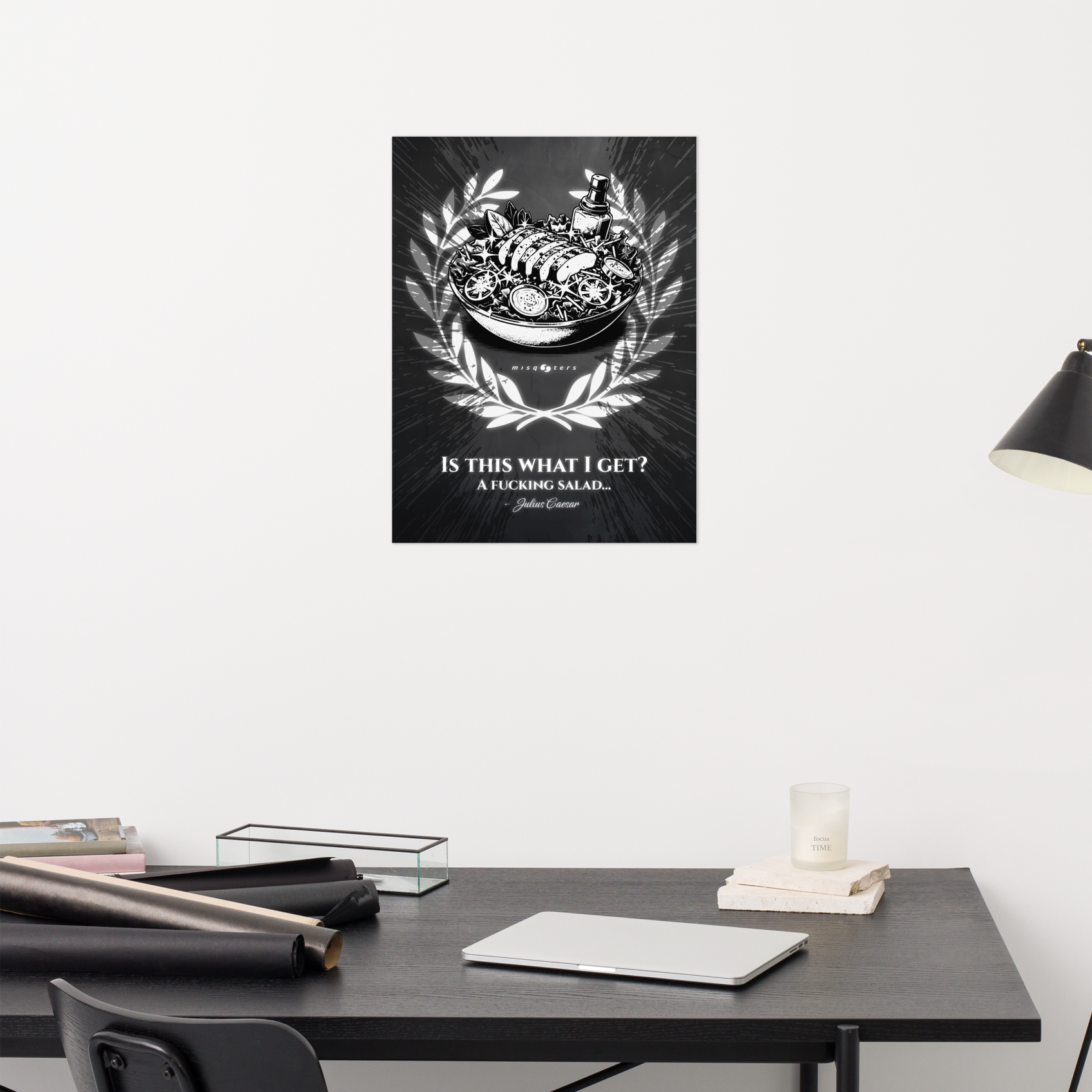 Poster with a design of a bowl and text on a wall above a desk.