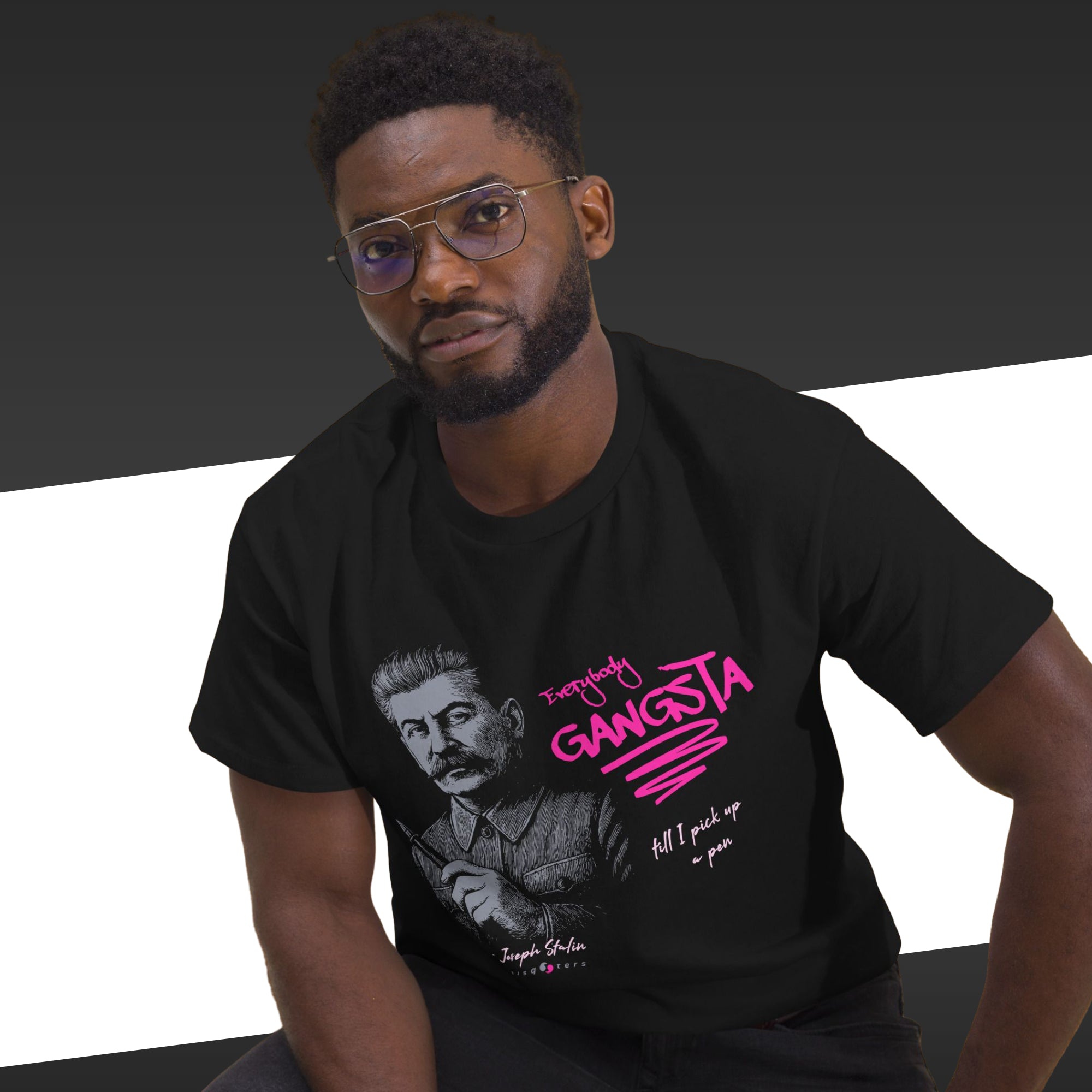 Man wearing a black t-shirt with graphic design and text