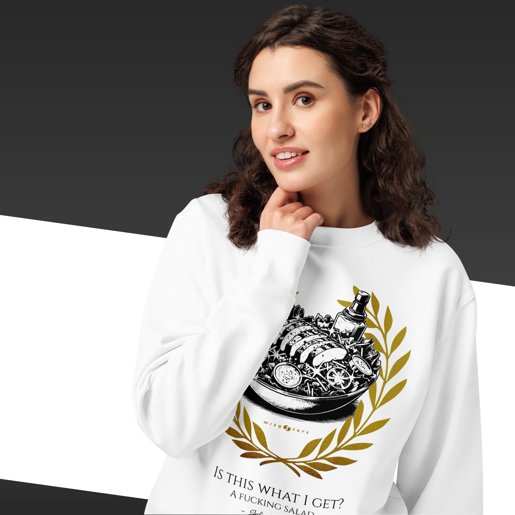 Person wearing a white sweatshirt with a graphic design and text.