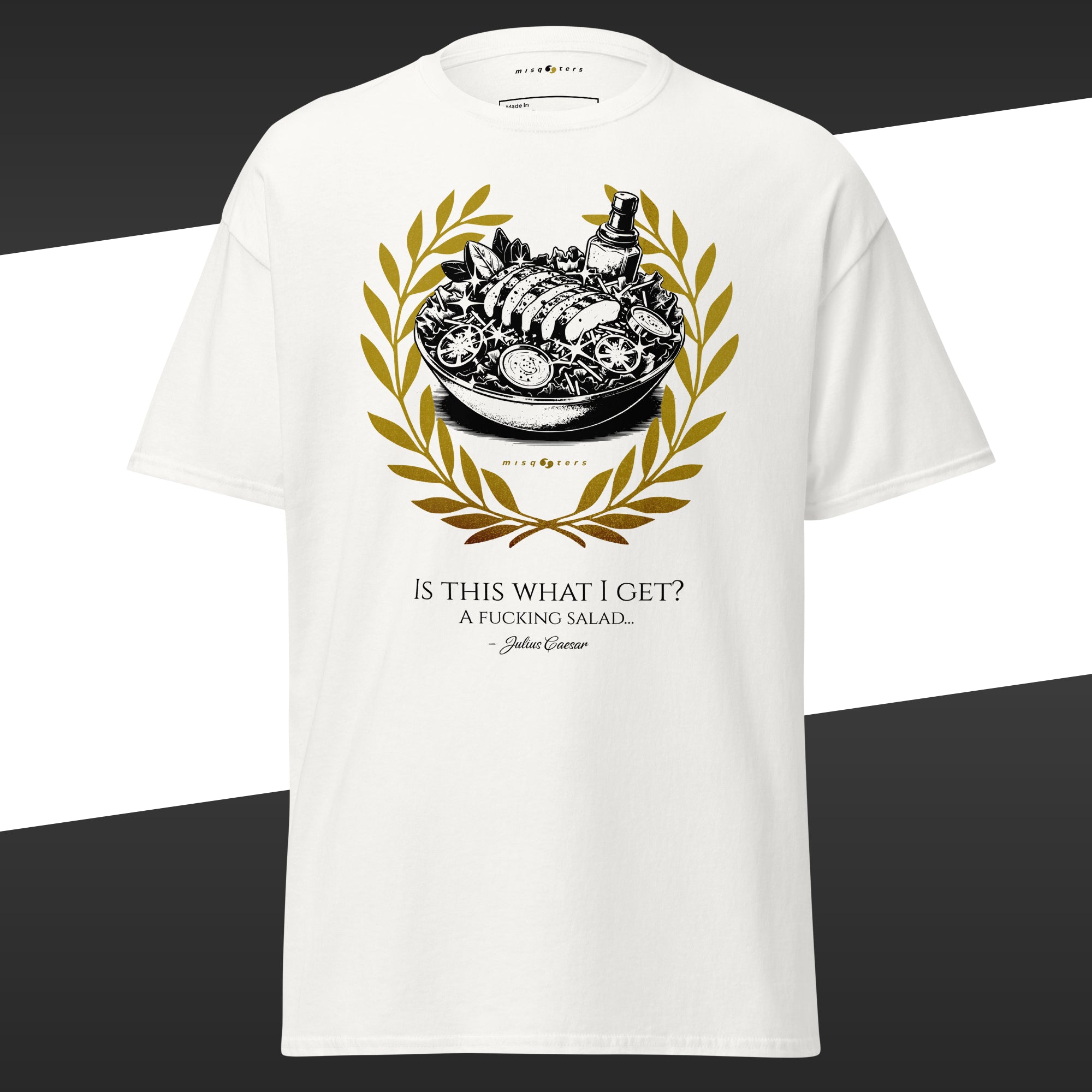 White t-shirt with a golden graphic design of a salad featuring the fake quote "Is this what I get" by Julius Caesar