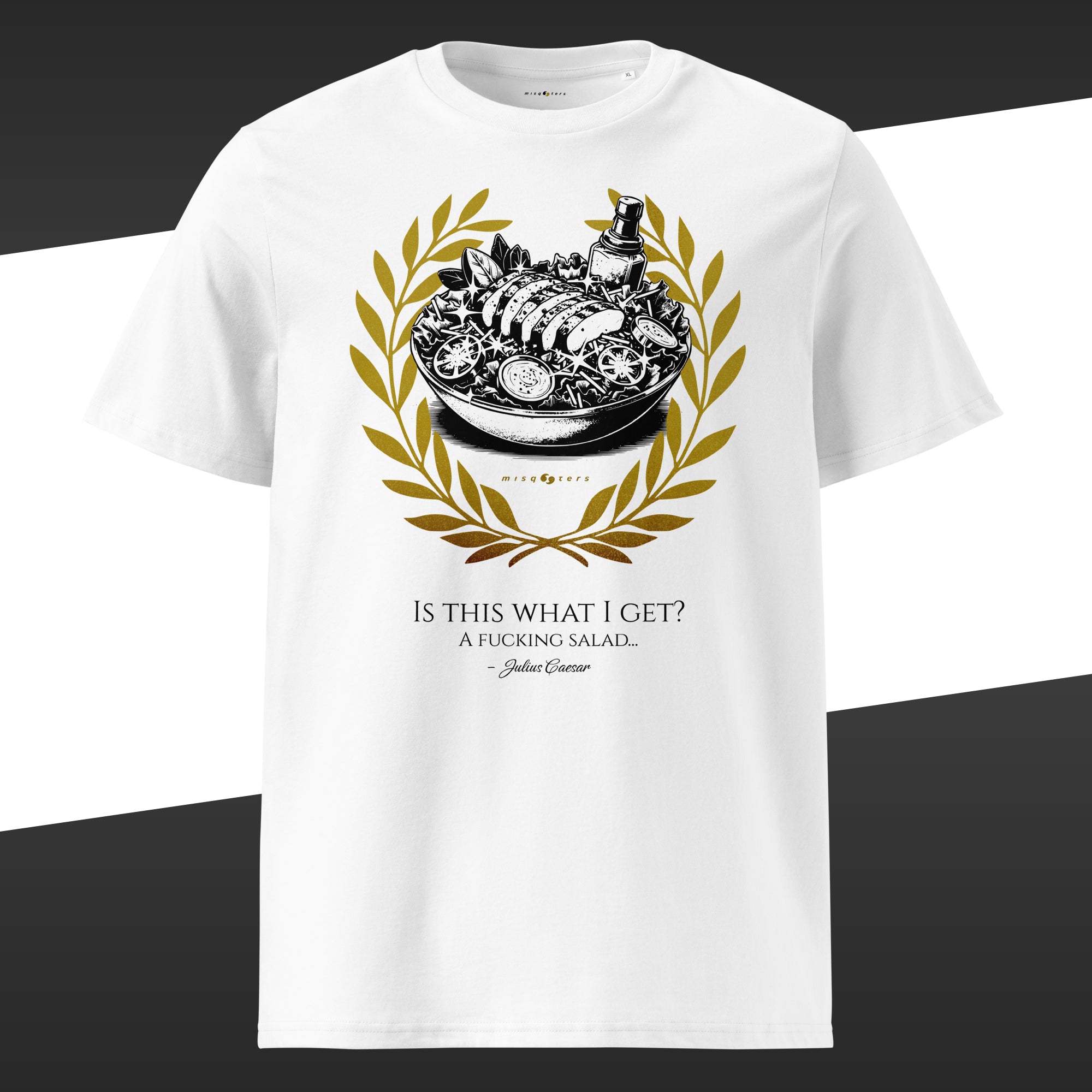 White t-shirt with a green graphic design of a salad bowl and laurel wreath on a white background and the fake quote "Is this what I Get?" From Julius Caesar on it.