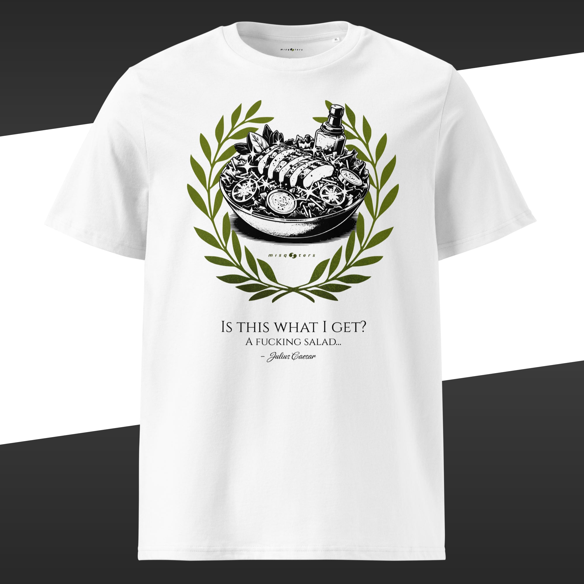 White t-shirt with a green graphic design of a salad bowl and laurel wreath on a white background and the fake quote "Is this what I Get?" From Julius Caesar on it.