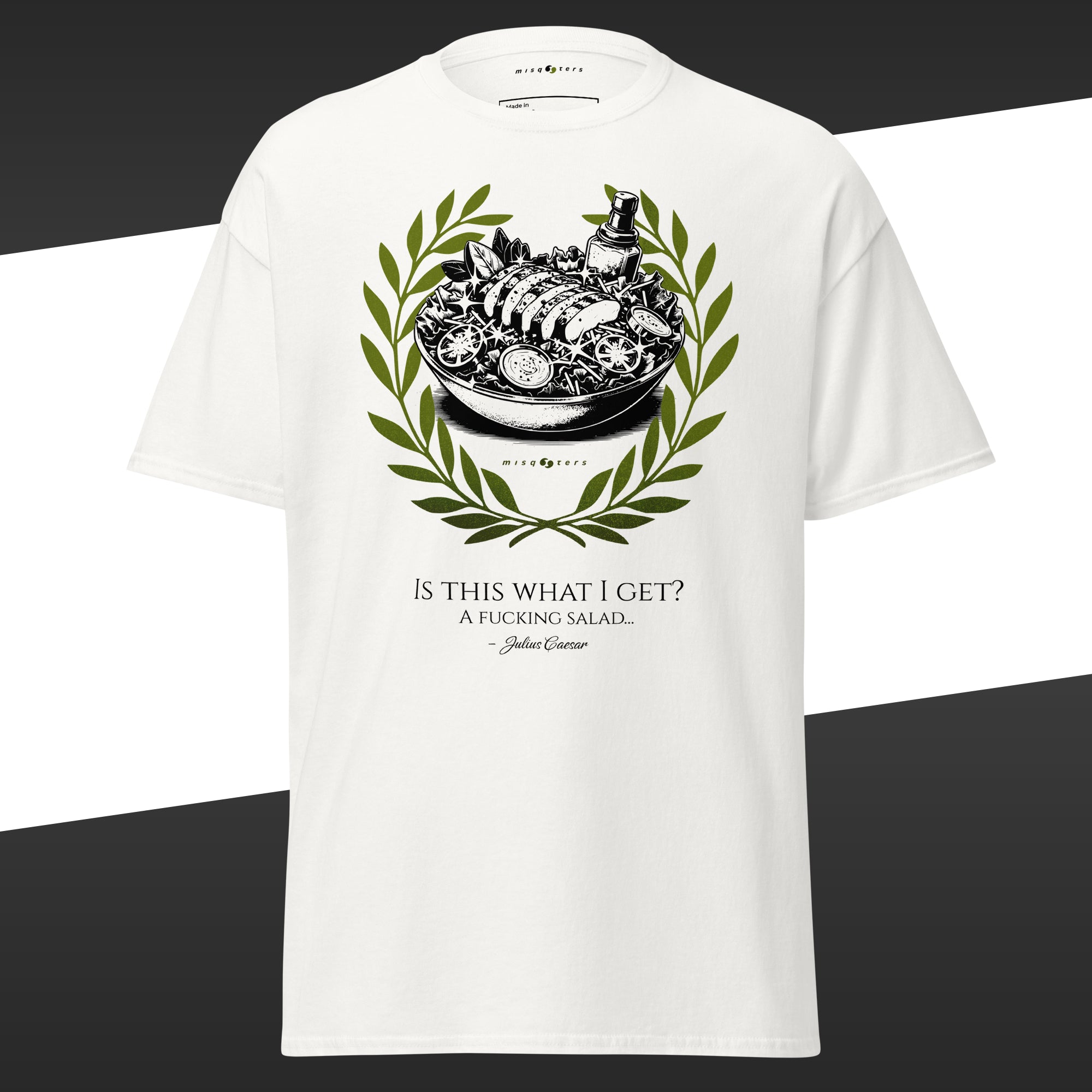 White t-shirt with a green graphic design of a salad featuring the fake quote "Is this what I get" by Julius Caesar
