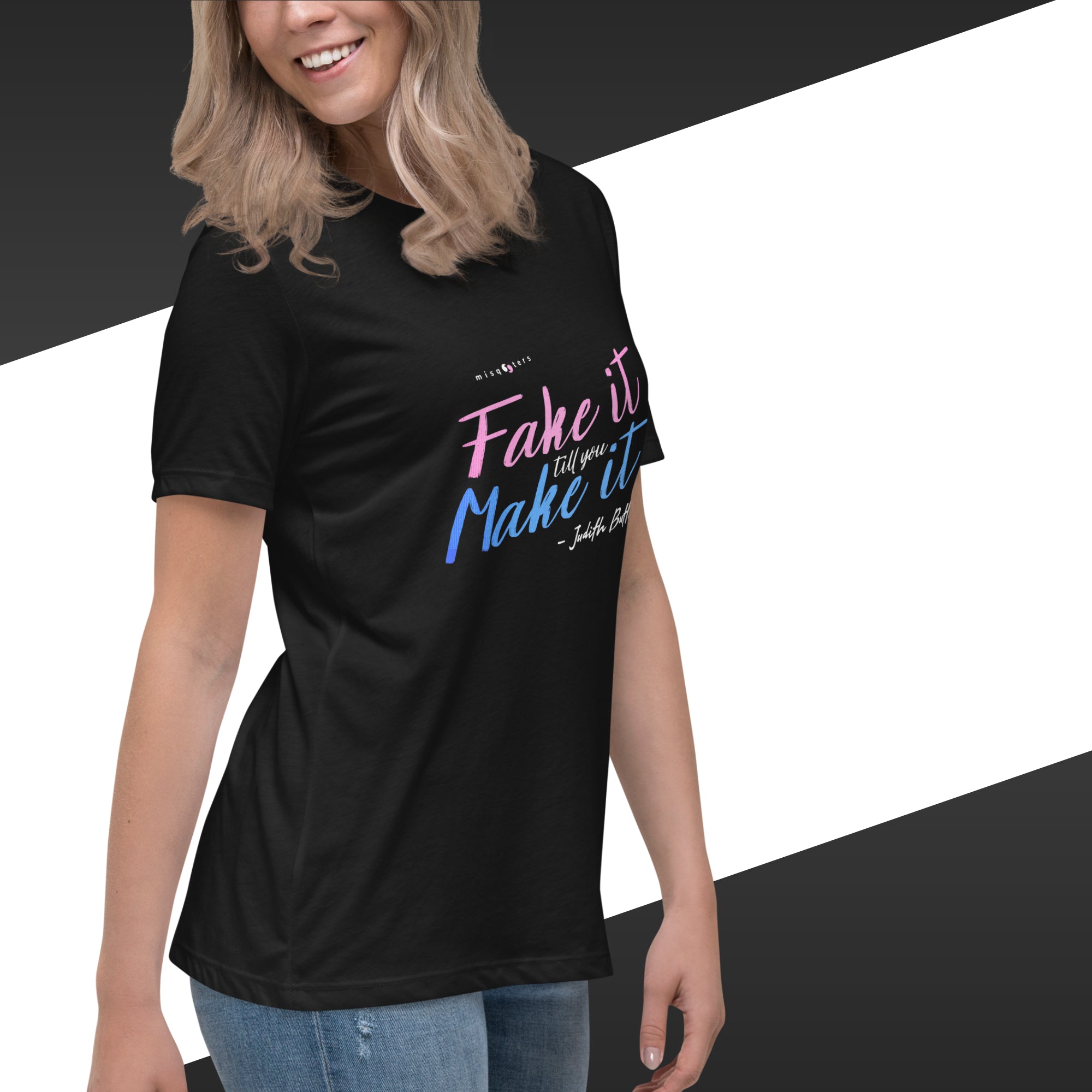 Person wearing a black t-shirt with colorful text design on a white background