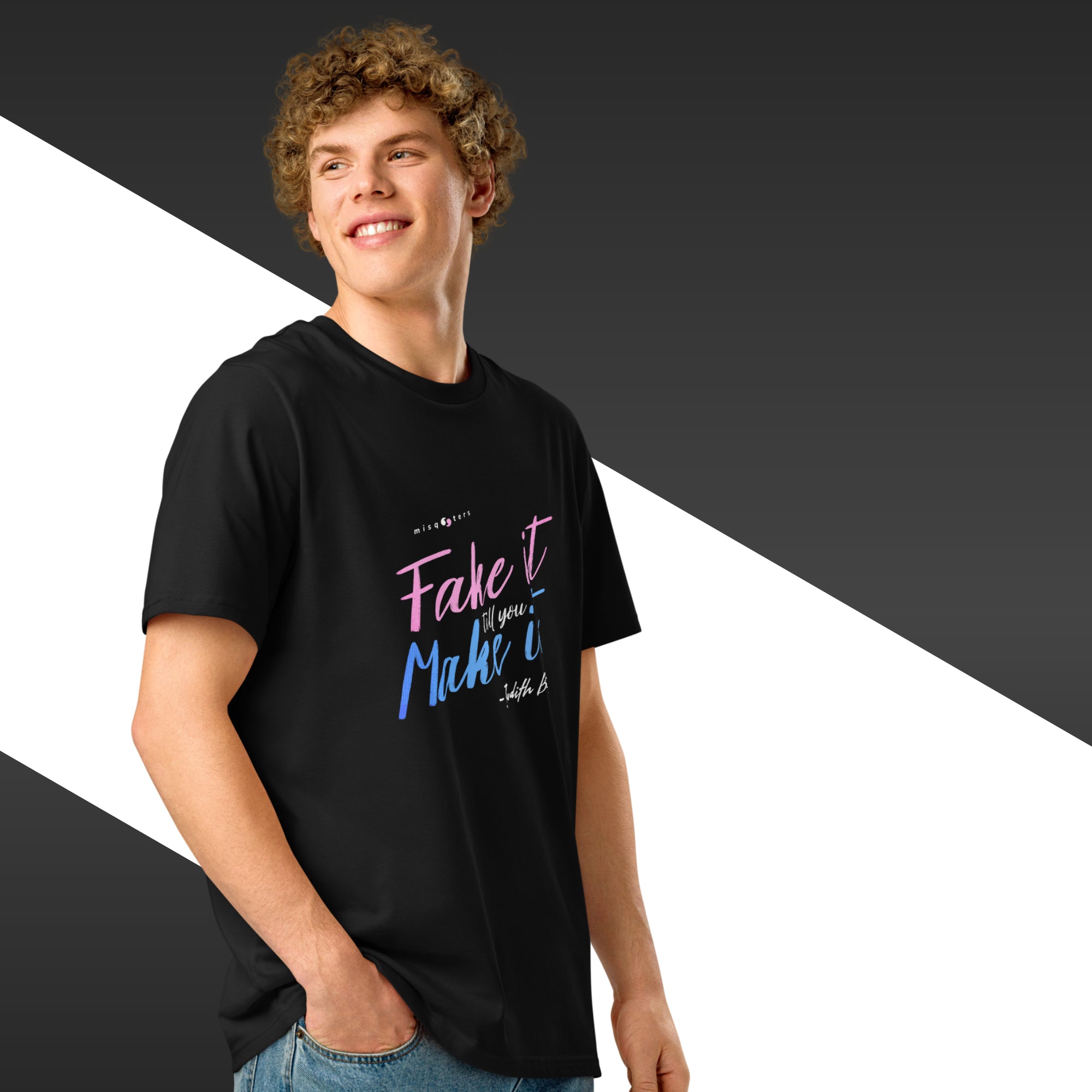 Person wearing a black t-shirt with colorful text on a black and white background