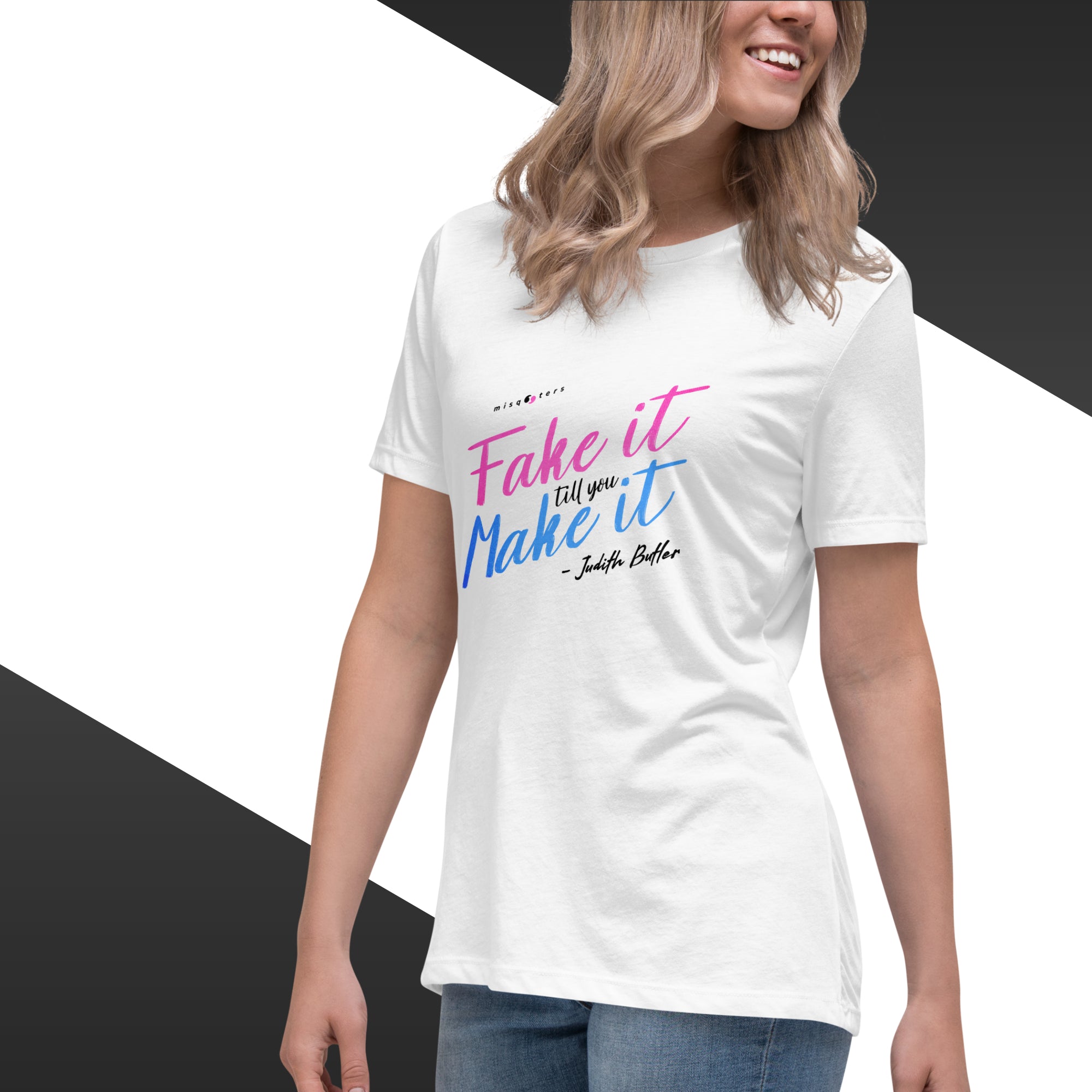 Person wearing a white t-shirt with colorful text design on a black and white background