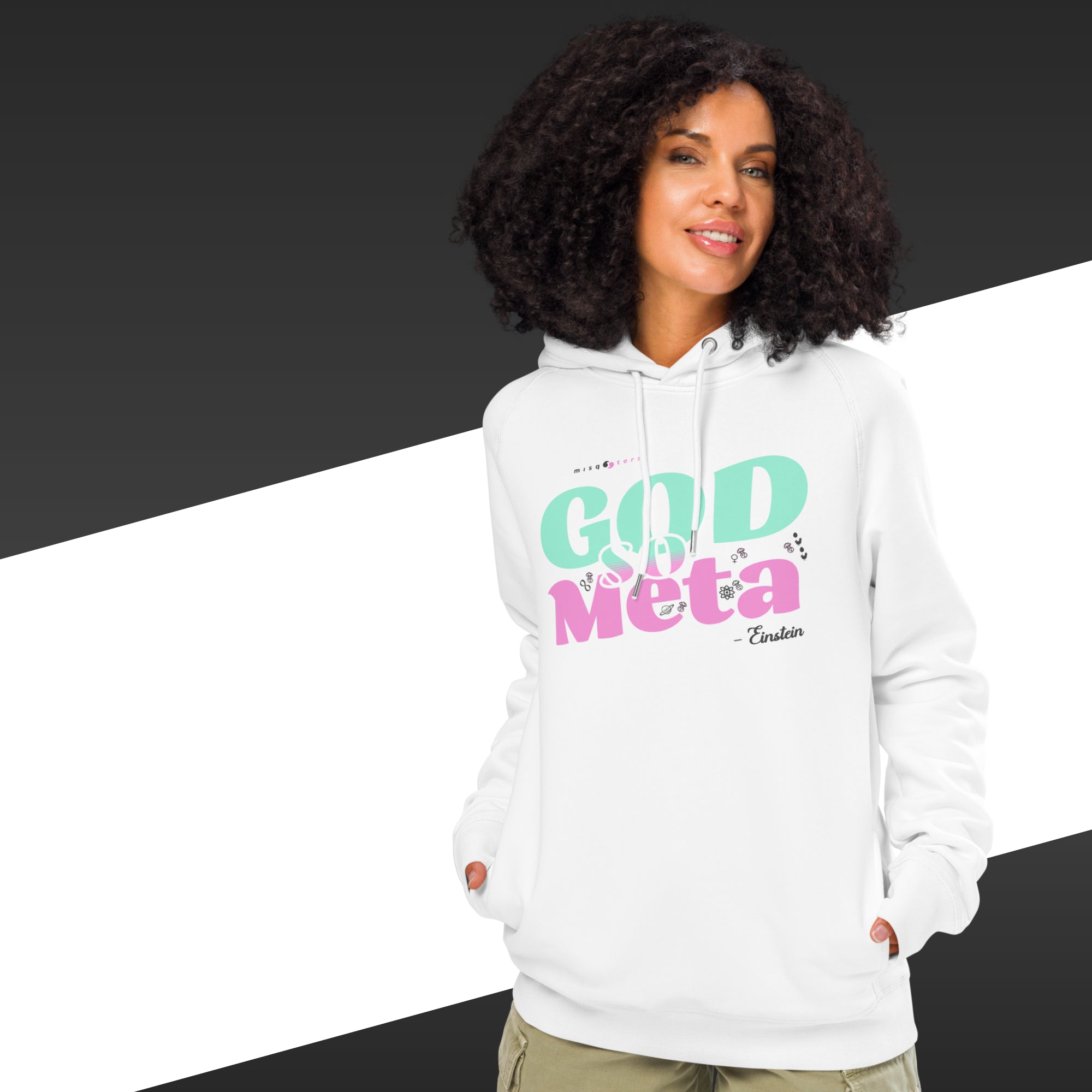 Woman wearing a white hoodie with colorful text on a black and white background