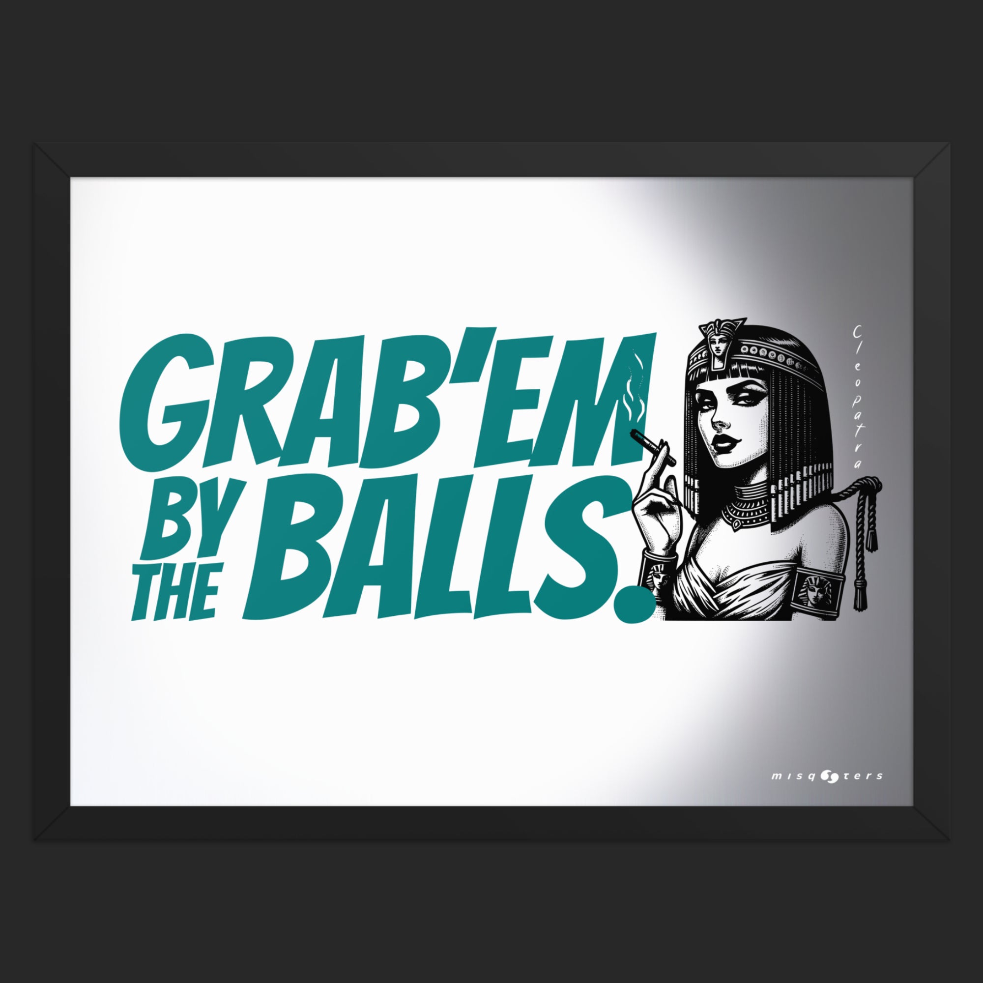 Framed artwork with text 'GRAB'EM BY THE BALLS.' and a stylized illustration of a woman in a headscarf.