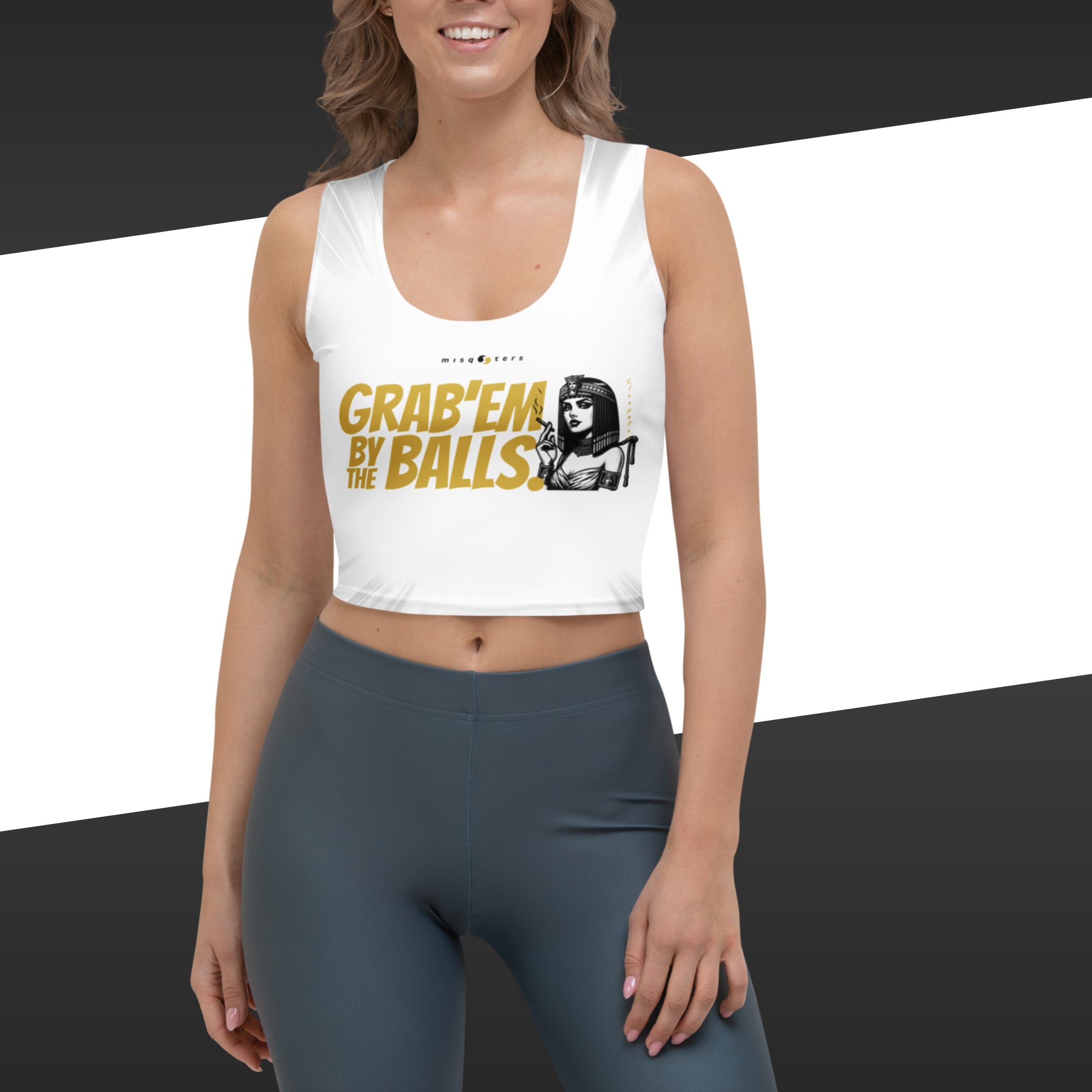 Woman wearing a white tank top with graphic design of Cleopatra featuring the fake quote "Grab´em by the balls" in yellow