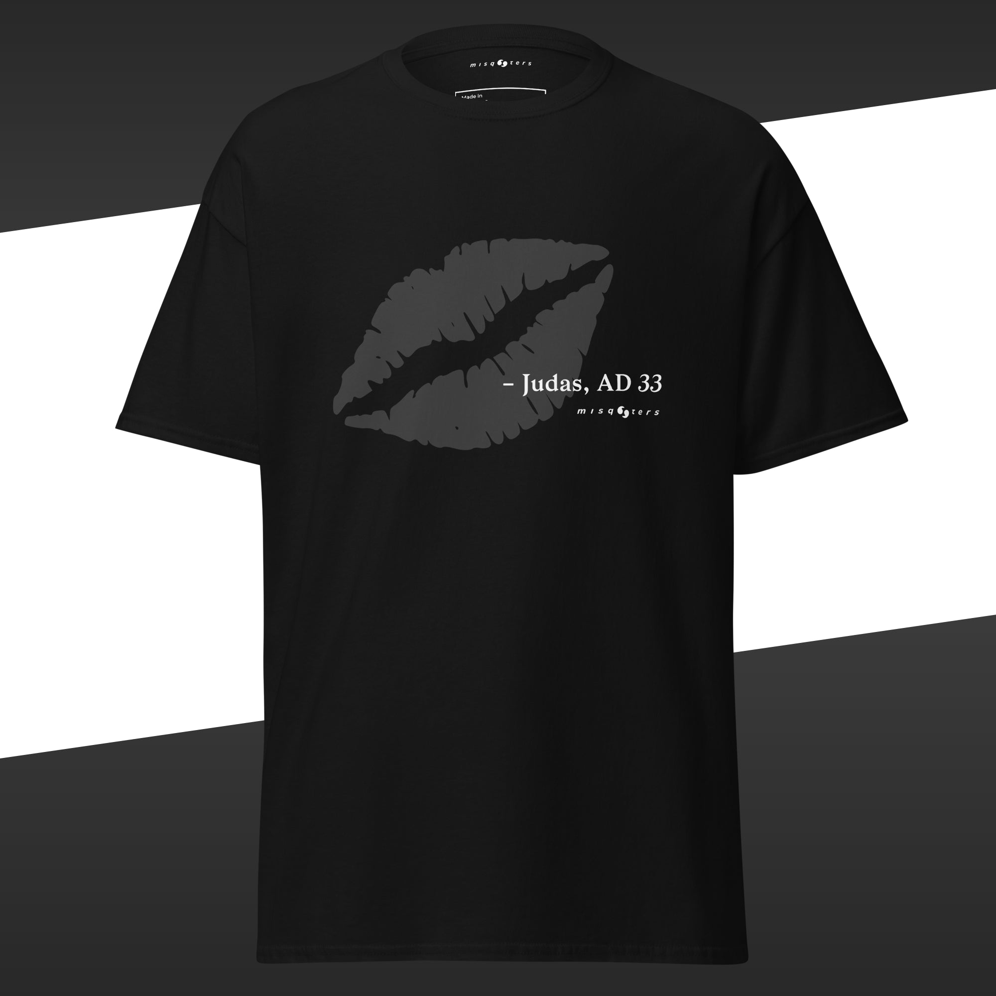 Black t-shirt with grey lips graphic and the text "- Judas, AD 33"
