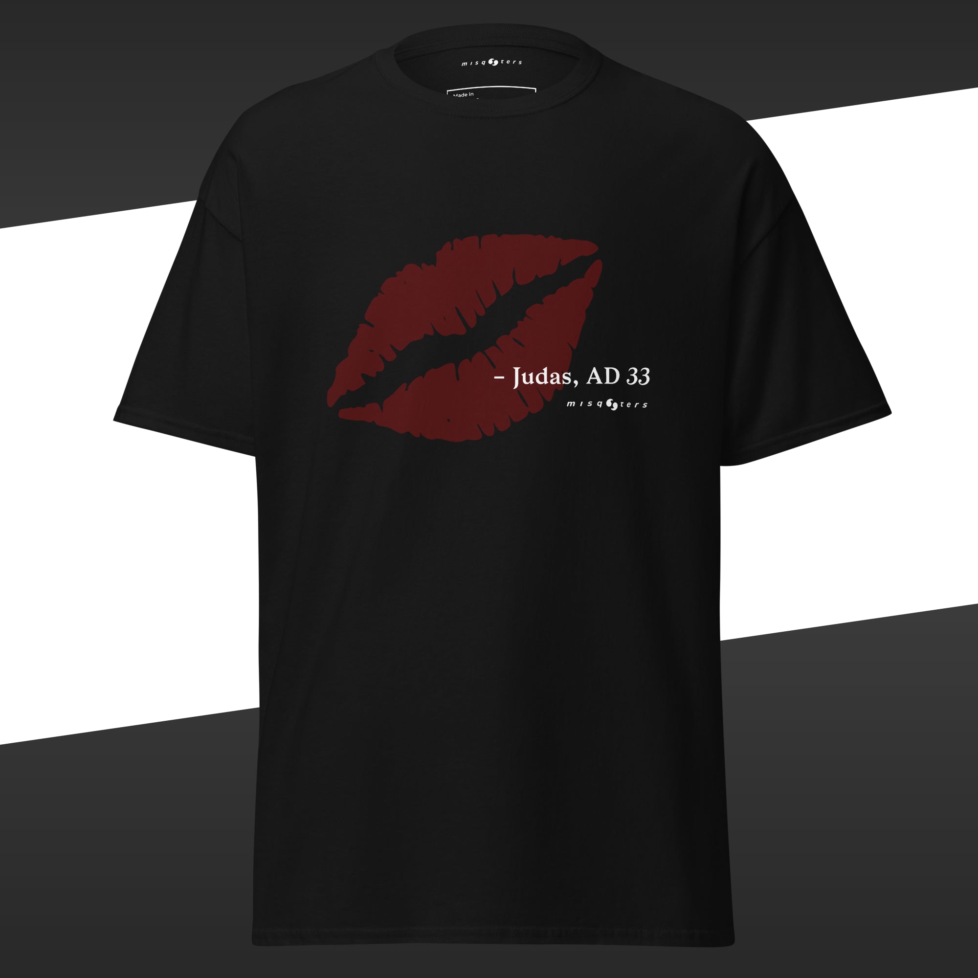 Black t-shirt with red lips graphic and the text "- Judas, AD 33"