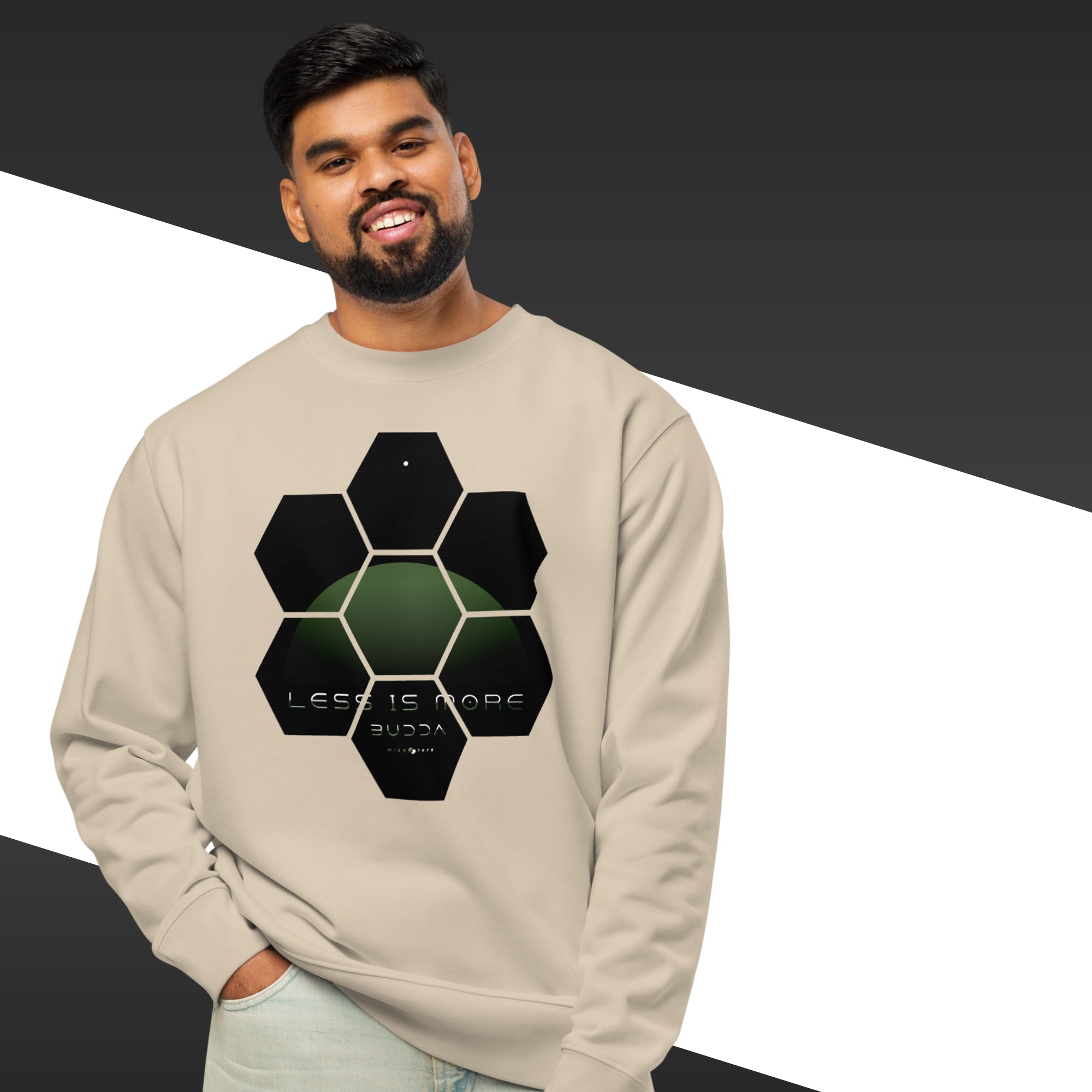 Man wearing a beige sweatshirt with geometric design and text on a black and white background