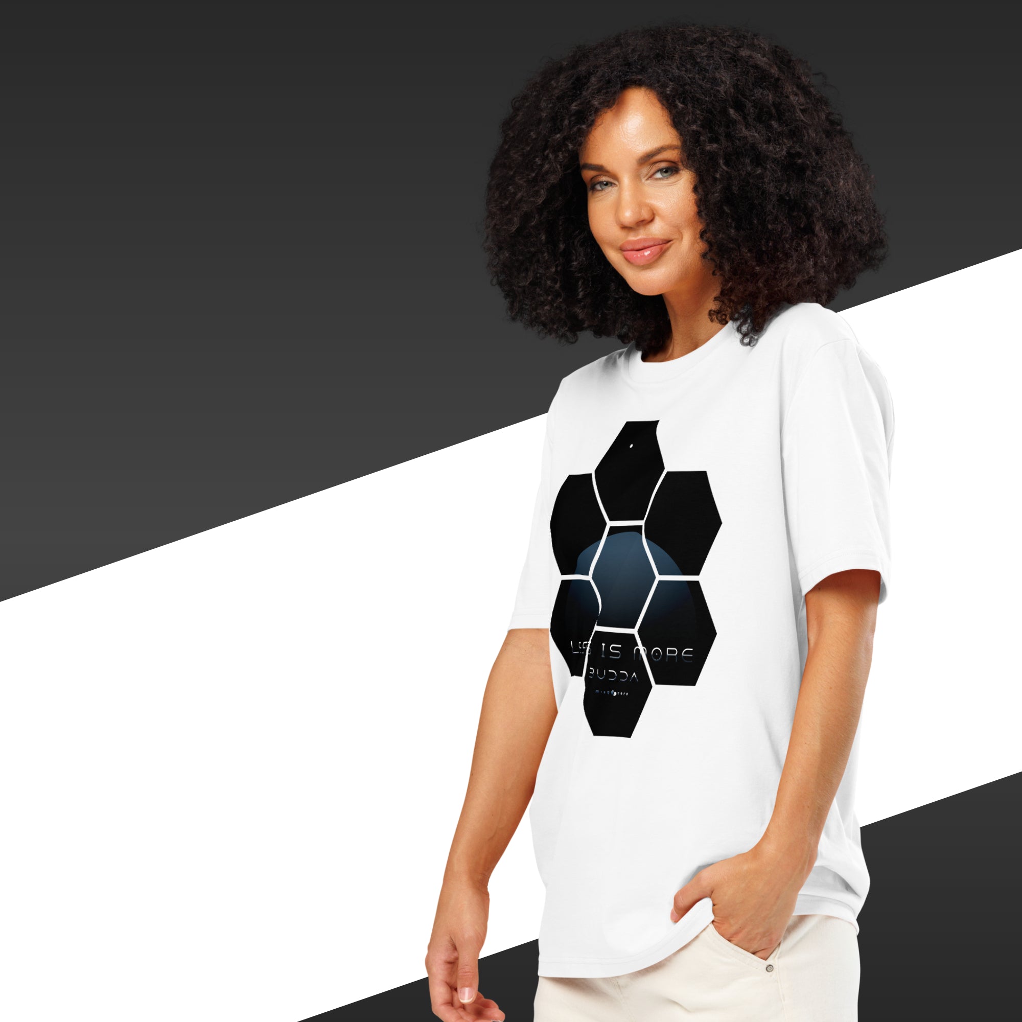 Woman wearing a white t-shirt with a geometric design on a black and white background
