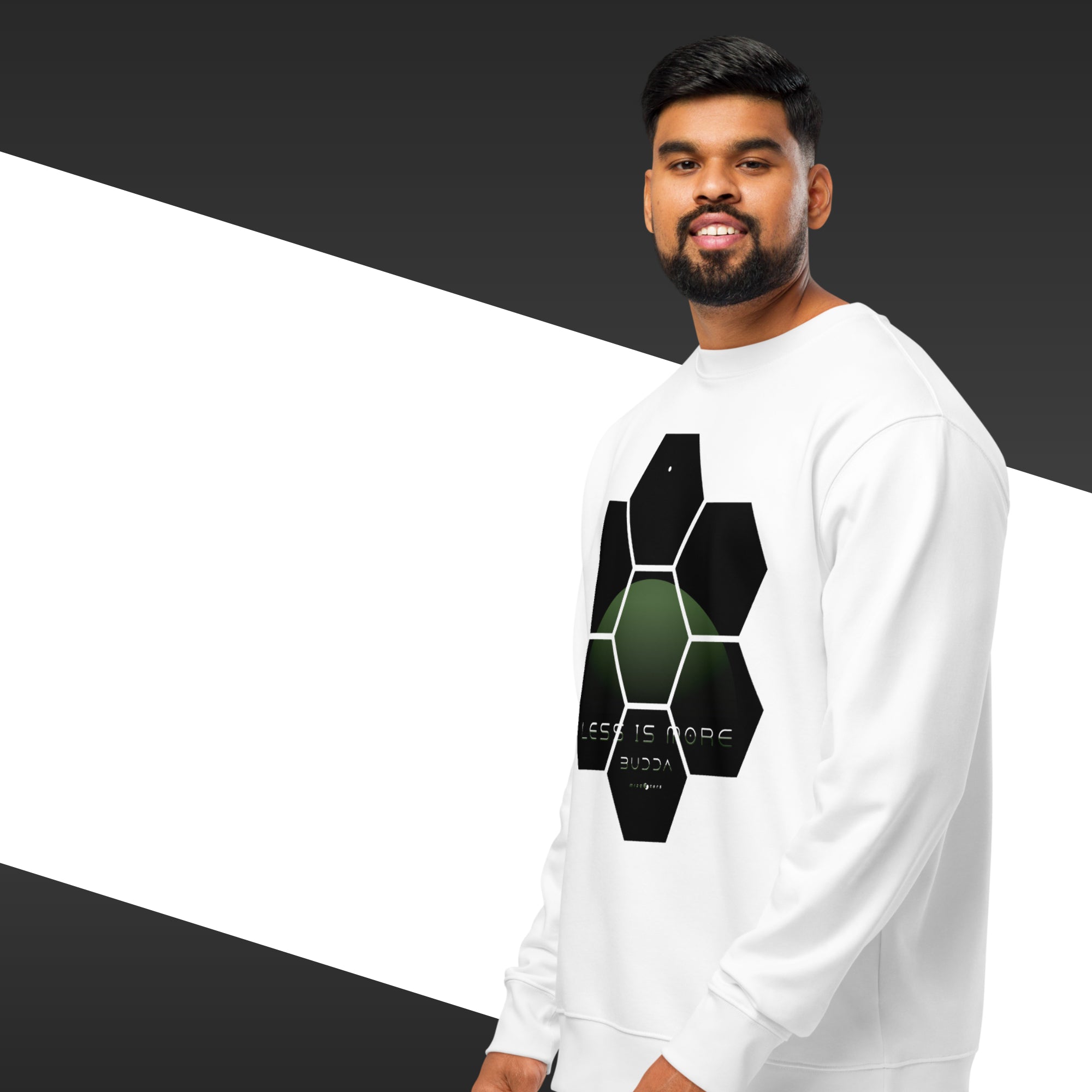 Man wearing a white sweatshirt with a black geometric design on a black and white background