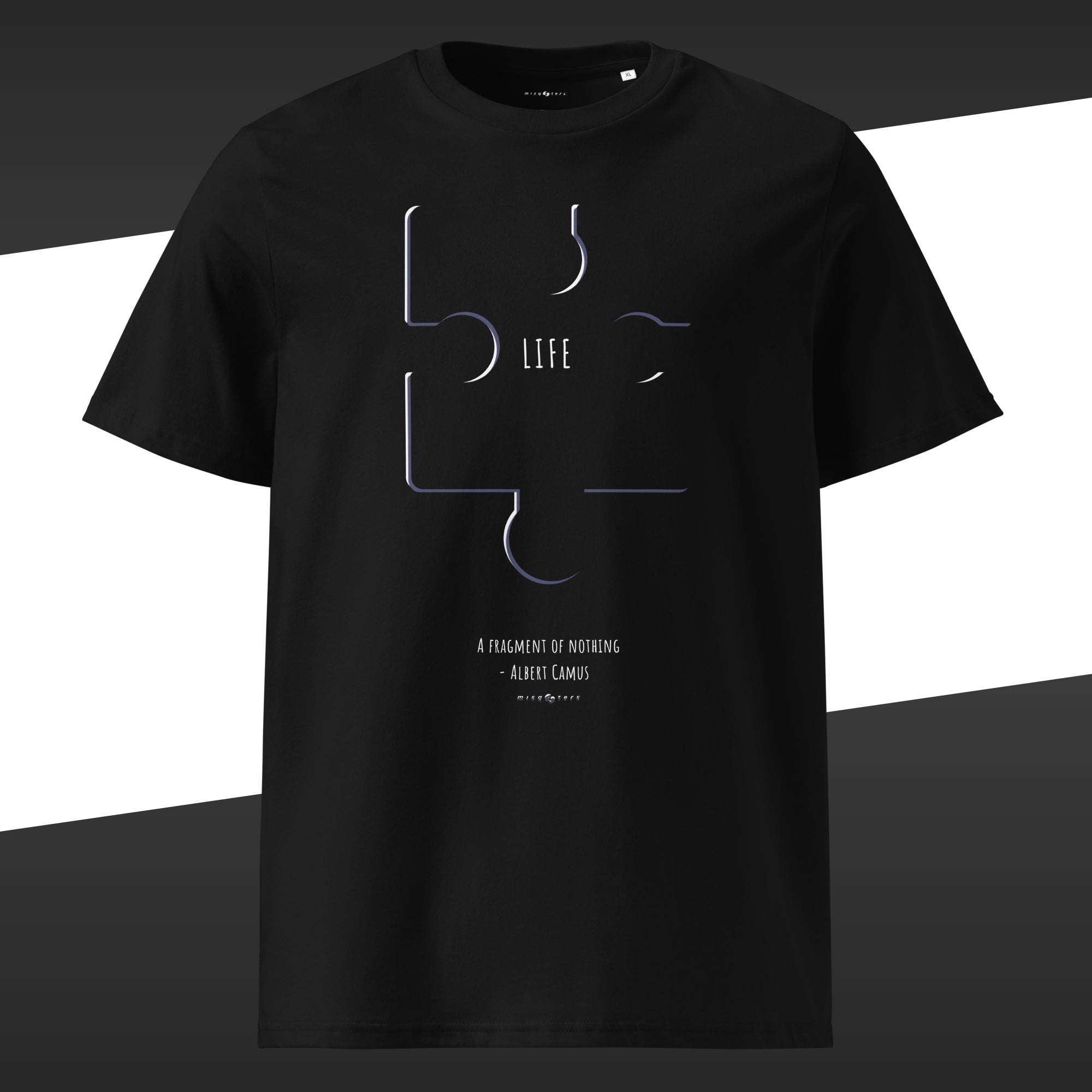 Black wide t-shirt with abstract design of a puzzle with the work "Life" on it and the fake quote "A fragment by nothing" by Albert Camus below