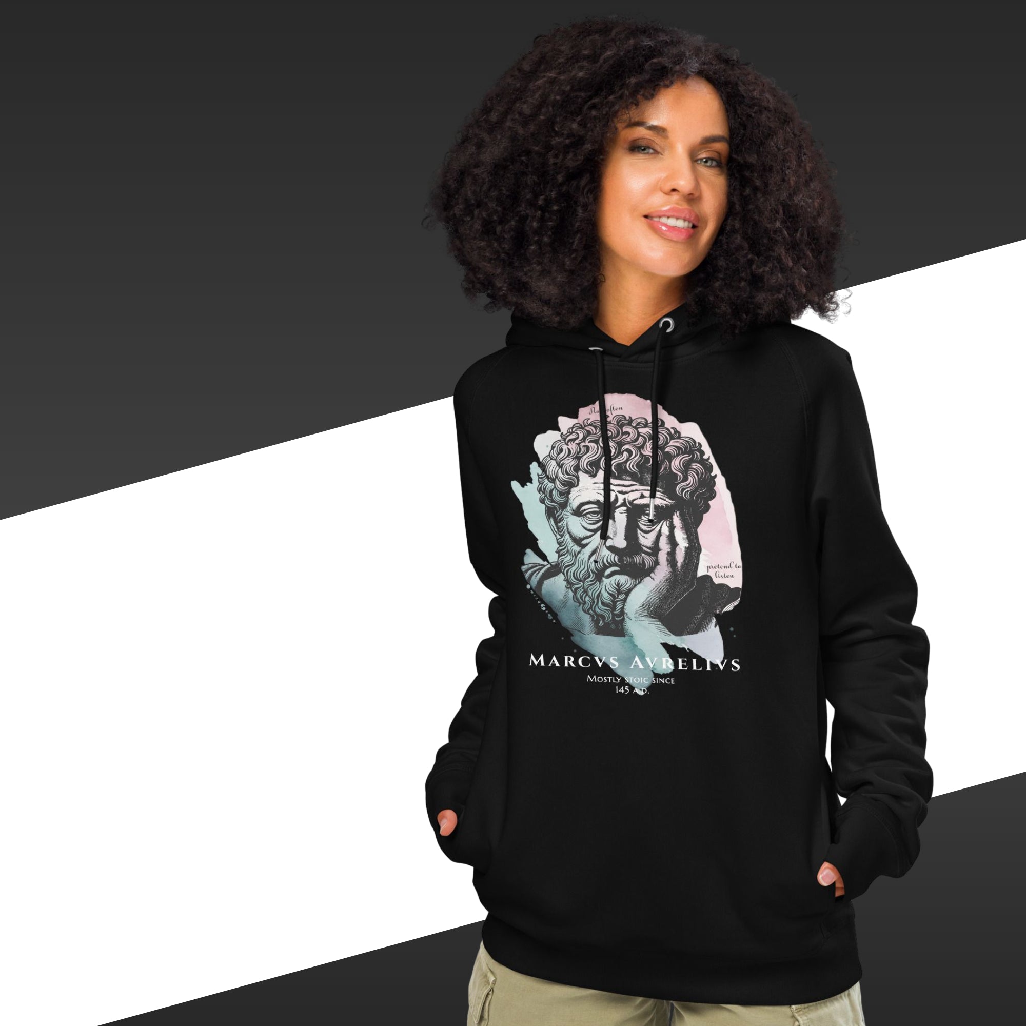 Person wearing a black hoodie with a graphic design on a black and white background