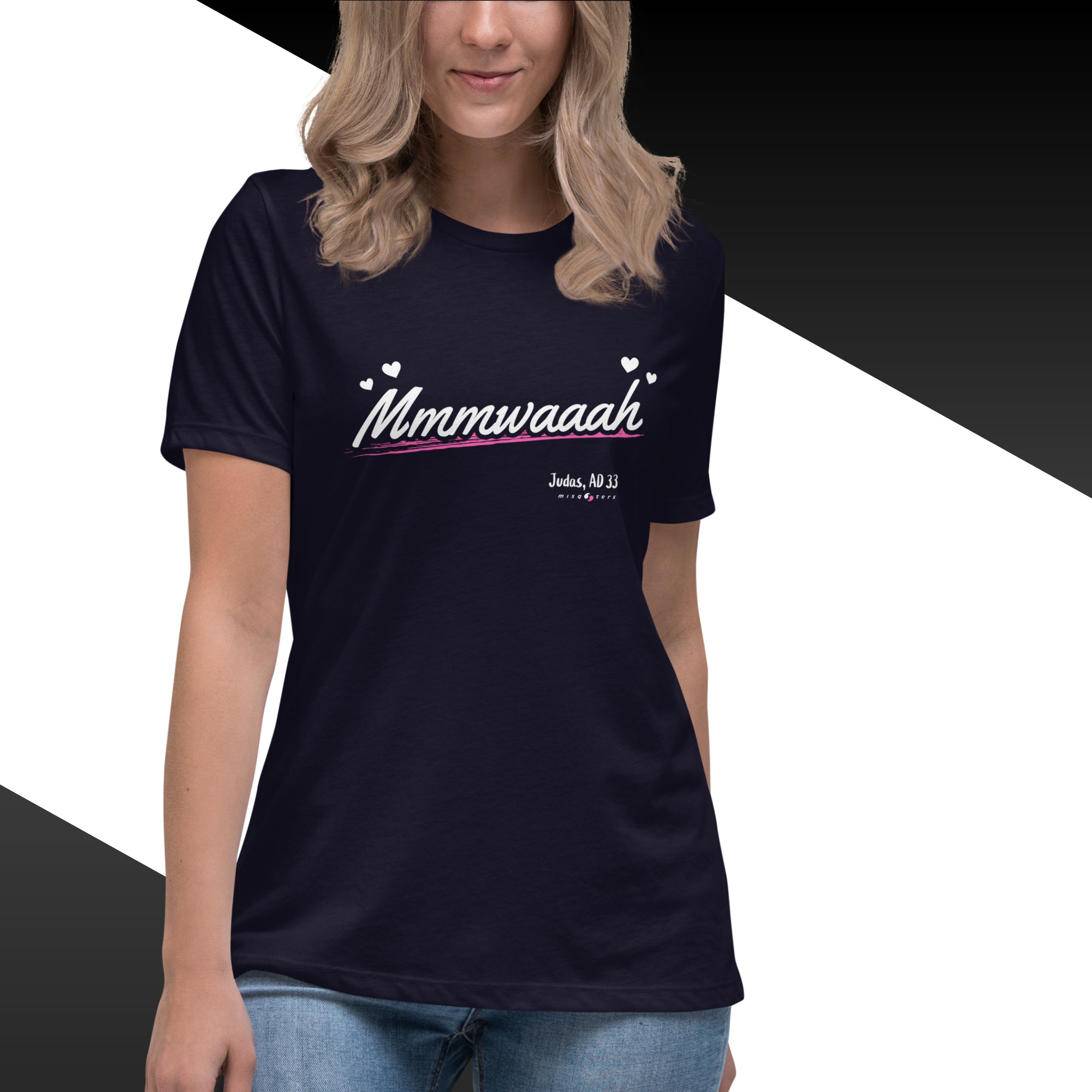 Woman wearing a black t-shirt with 'Mmmwaaah' text design.