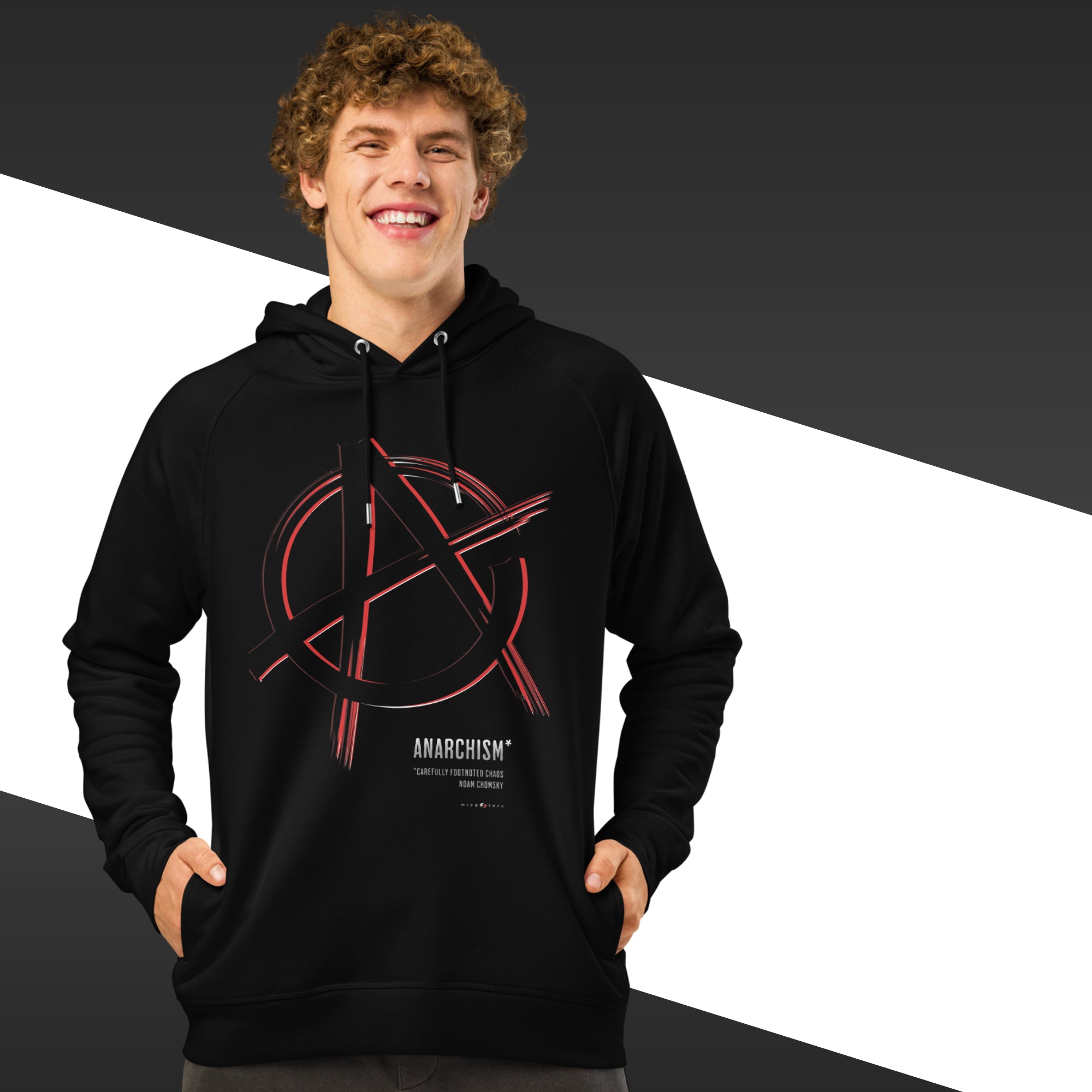 Man wearing a black hoodie with an anarchism symbol design on a black and white background